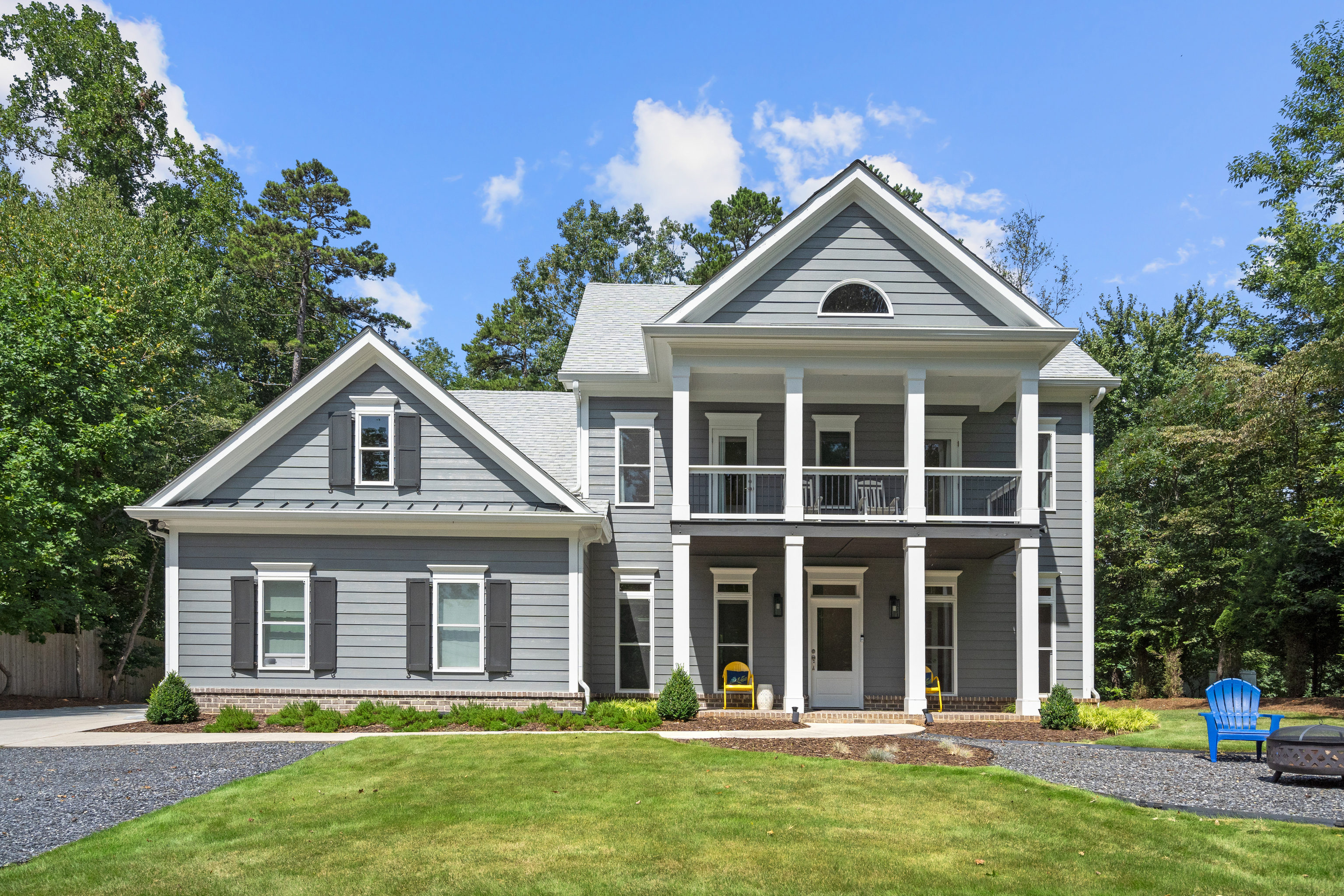 Nearly new CUSTOM home on a POOL READY .73 lot! Year round lake views from the double front porches! Designer white interiors! Main level has office, guest suite, dining, kitchen, and family room. Kitchen features white cabinetry, gas cooktop/range and a peninsula island. Open to the family room which features a contemporary gas fireplace. Upstairs are 3 bedrooms, including the primary suite. 2 bedrooms have access to the covered balcony with those gorgeous views! Hall bathroom features dual sinks, marble counter. Bonus room could be a 5th bedroom, gym or 2nd family room! Outside is a level, professionally landscaped yard with brick paver patio, 10*12 Graceland shed, and complete privacy! This home is energy efficient, and the builders of this home left no detail untouched. Deer creek shores is a tight knit community with organized events and nearby lake access at Young Deer Park. Zoned for the new East Forsyth High School! RV storage is no problem at this home and has a RV charger installed. Driveway is wide enough for boat storage as well. Parking pad for guest parking. Septic located in front, making pool installation a breeze! Come live the lake life in this pristine, custom home!