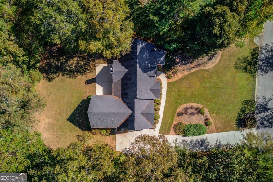 Welcome to 3980 Lakeside BLVD your beautiful, move-in ready, ranch home in the highly sought after Woodlake Country Club. This single level living home is situated on a private lot across from the golf course and pocket park along lakeside boulevard. This home wows with its low maintenance brick and vinyl exterior on a very level lot. Entering the home, the open floor plan boasts all new paint, luxury vinyl plank flooring, new carpets, updated fixtures, new granite and quartz counters throughout. The well appointed split bedroom plan features vaulted ceilings and generous closets. The kitchen is large and open for entertaining and cooking. The primary bedroom is on the main floor leaving the only reason to go up the steps is to enjoy the large bonus room and additional bath. The seller also has recently put on a new roof, new hvac, and a new hot water heater. Don't miss out on this beautiful home.