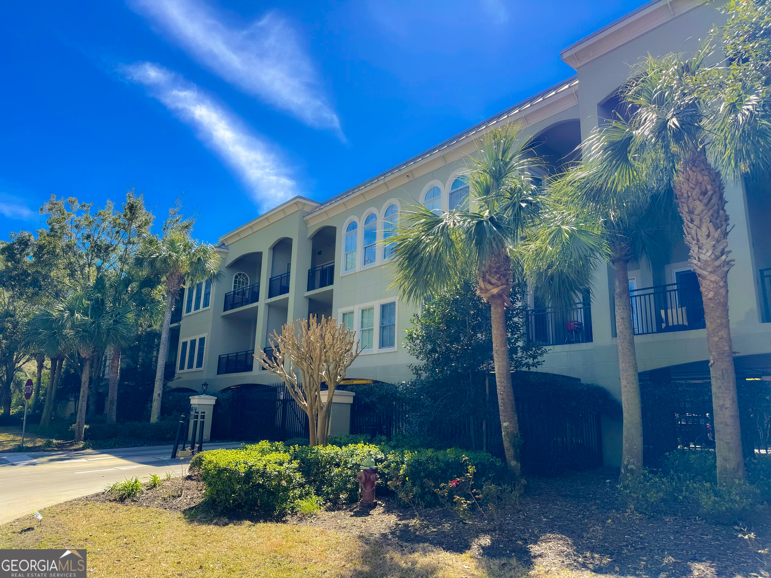 Introducing this Rare Opportunity for a Top-Floor, End-Unit Studio Condo in the Sought-After South End of St. Simons Island. Quietly Located Away from the Pool with a View of the Famous Hazel's Cafe. This Turn-Key Residence Is Just a Short Bike Ride from King & Prince Beach, the Pier/Village, Lighthouse, and Popular Dining Spots Like Fiddlers, Crab Daddy's, Barrier Island Brewing, Crab Trap, and Beachcomber. ||| The Condo Boasts a Kitchenette Equipped with a Sink, Cooktop, Microwave, Dishwasher, and Full-Size Refrigerator. The Spacious Living/Bedroom Area Features Hardwood Flooring, Complemented by a Large Laundry Room and Walk-In Closet with a Stackable Washer/Dryer. The Large Full Bath Includes a Separate Tiled Shower. Enjoy the Serenity of a Private, Covered Rear Balcony that is Perfect for enjoying Breathtaking Sunsets, Sipping Your Morning Coffee, or Unwinding After a Day at the Beach. This Private Retreat Offers the Ideal Spot for Relaxation and Scenic Views in Every Season. Also, this End-Unit Condo has the Largest and Most Scenic Front-Area Terrace and Offers the Perfect Spot to add Table & Chairs, a Cooler, Decorative Touches, and More. It's the Best Front-Area Option in the Entire Complex-Perfect for Relaxing and Enjoying the View! (See Photos) ||| Salt Air Villas Is a Gated Condominium Complex Offering Covered Parking, an Elevator, a Private Pool, Luggage Carts to use for Arrival & Departure, a Community Shopping Cart to Load Groceries from your Car, etc., and a Community Outdoor Grill. There is a Designated Bicycle Parking Area and a Convenient Wash Station for Rinsing Off Sand from Beach Chairs, Gear, and More. ||| This Condo Presents Excellent Rental Potential and Is Ideal as a Vacation Home or Primary Residence for Individuals or Couples Seeking Island Life Near the Beach. ||| Condos in This Complex Rarely Become Available, Making It a Prime Investment Opportunity.