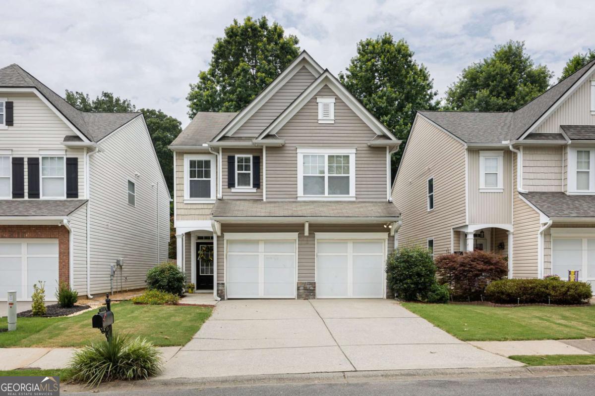 Move-in ready, this home in Prominence Point checks all the boxes! The layout is open and bright with tons of natural light and fresh, neutral paint throughout. You'll love the easy-care luxury vinyl flooring on the main level. Downstairs has a great flow with a large living room and fireplace, a separate dining area that opens to a private, fenced backyard, and a spacious kitchen with stained cabinets, a pantry, laundry area, and step-less entry from the garage. Plus, the kitchen now has brand-new stainless steel appliances! Upstairs, you'll find three bedrooms, two full baths, and a bonus office (or a 4th bedroom if you need it). The owner's suite is filled with natural light and includes a large bathroom with a garden tub, separate shower, and walk-in closet. The two secondary bedrooms are freshly painted and share a full bath. Prominence Point is a great swim/tennis neighborhood with a playground and a big grassy common area right out front. And you can't beat the location-just minutes from I-575, shopping, dining, and both downtown Canton and Woodstock.