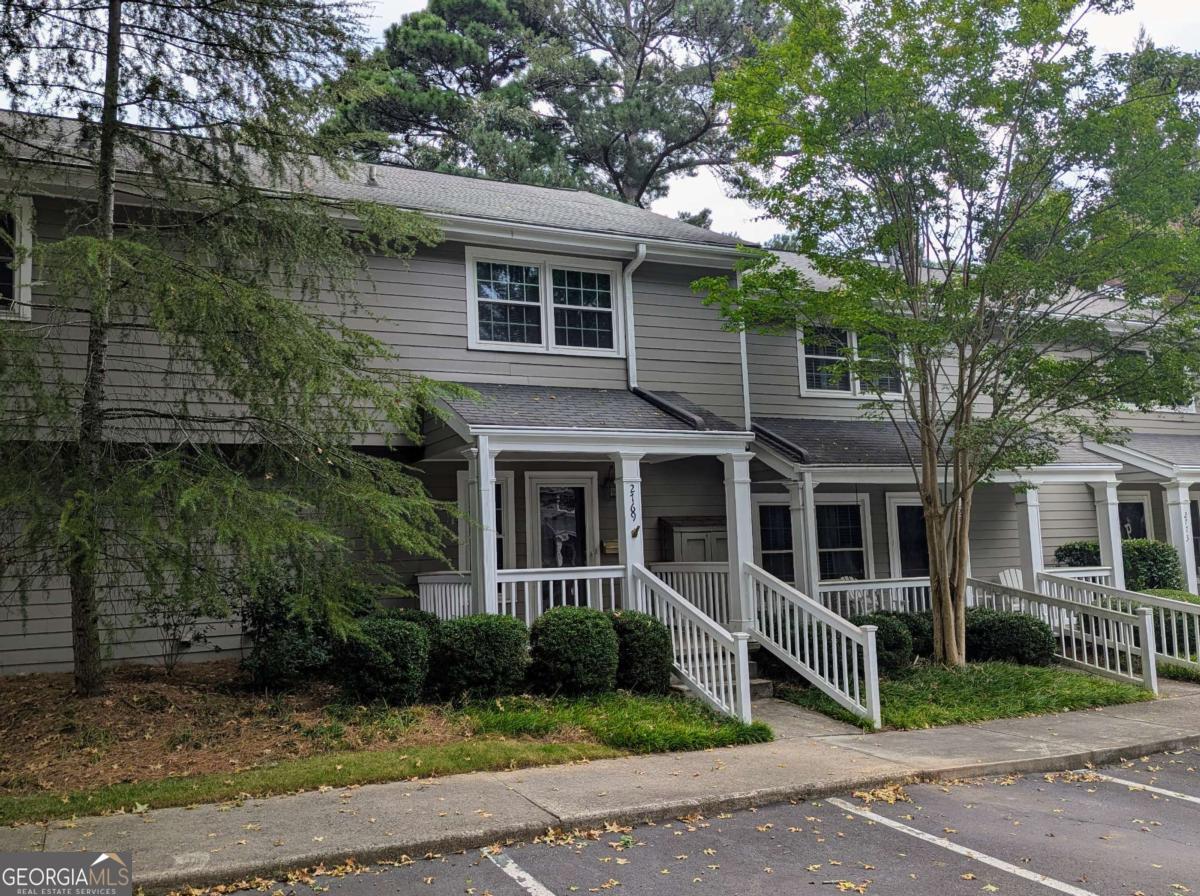 Home Run Living in Smyrna: Where Lifestyle Meets Smart Investment! Welcome to 2769 Farmstead Road located minutes from TRUIST PARK, home of your Atlanta Braves a charming 2-story condo that checks all the boxes for both savvy investors and lifestyle-minded buyers. Tucked into a quiet, tree-lined community in Smyrna, this home is full of potential and personality. Whether you're ready to make it your own or turn it into your next smart flip or rental, this one's a grand slam. INTERIOR Step inside and you'll find ~1,400 square feet of functional living space. The main level features a bright living area, dining room, gorgeous Brazilian hardwoods, a pass-through galley kitchen with abundant cabinetry, and a large laundry room that could double as a mudroom or added storage. The layout flows easily, offering both comfort and creativity for your future plans. Upstairs, you'll find the primary suite and two additional generously-sized bedrooms are perfect for guests, roommates, or that long-awaited home office. Enjoy morning coffee or evening chats on the large covered front porch, or retreat to your private fenced back patio (overlooking the Pool!) - ideal for entertaining, relaxing, or creating a charming container garden oasis. SMART FEATURES & VALUE ADDS NEW HVAC (2024, full replacement), NEW sliding door window, NEW picture window,annually maintained water heater; HOA covers roof, exterior pest and maintenance, pool, and clubhouse; Sidewalk access to nearby parks and trails; Quiet community ideal for both living and leasing. LOCATION THAT SCORES BIG Located just minutes from Truist Park, The Battery, Jonquil Park, Silver Comet Trail, and Cumberland Mall, you'll have top-tier shopping, dining, and recreation right at your doorstep. Commuting is a breeze with quick access to I-75, I-285, Buckhead (15 min) and Hartsfield-Jackson Airport (25 min). Whether you're stepping up to your first home or sliding into your next great investment, this Smyrna gem offers the best of both worlds: location, livability, and long-term upside. READY TO WALK THE BASES? Let's talk strategy, goals, and what makes this the right move-whether you're buying to live, lease, or flip.