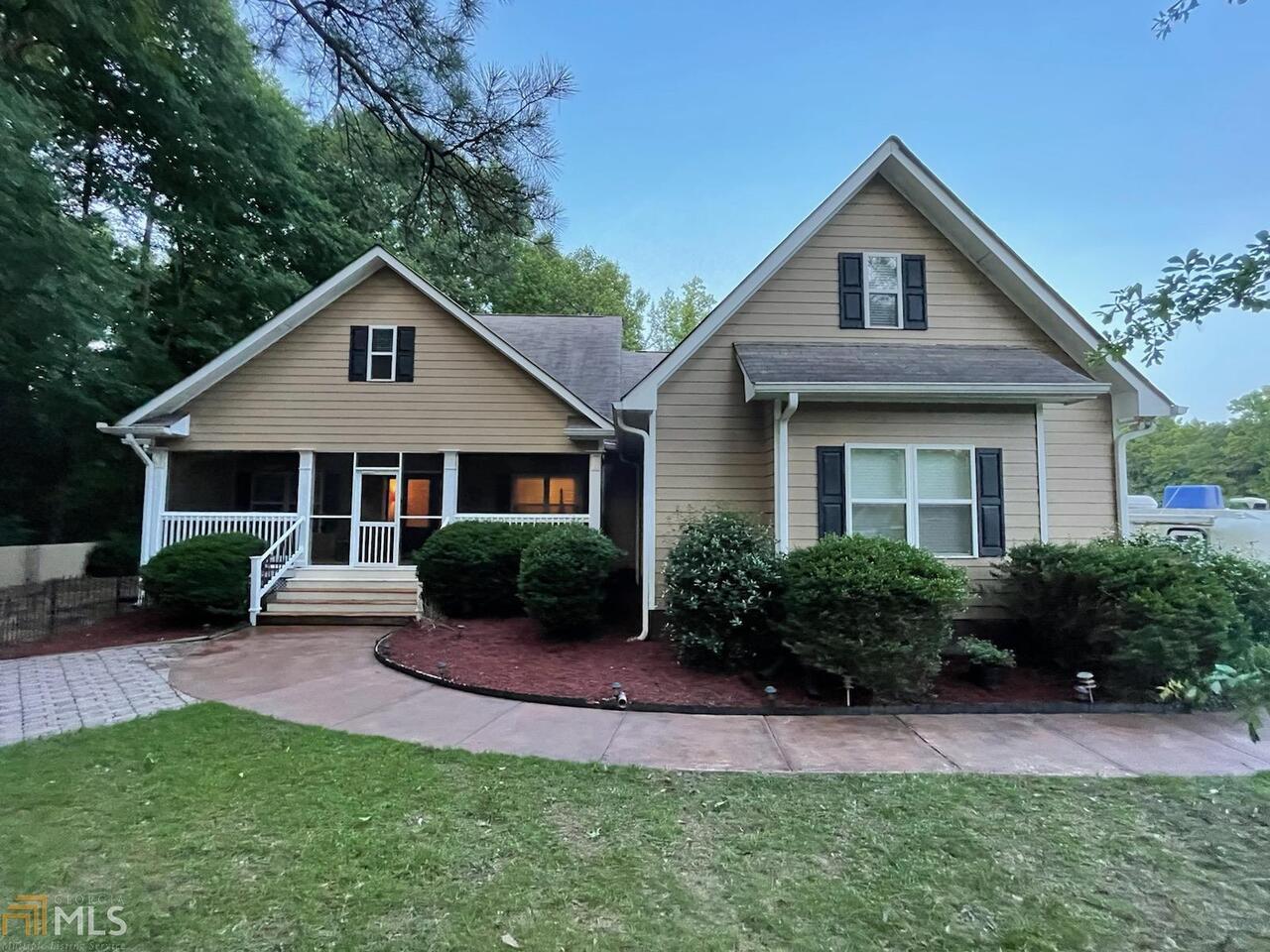 If privacy is what you are looking for then you have found it in this amazing 10 acre horse farm! This light and airy three (to four) bedroom split bedroom plan home features plenty of natural light and 9 foot ceilings. A welcoming and screened in front porch leads you to the open floor plan with formal dining room and a vaulted great room's focal point is the stunning fireplace. Hardwood floors throughout. The inviting kitchen features stainless steel appliances, granite countertops, breakfast bar. An open, bright and airy sunroom has a farmhouse style gardeners' sink with access to the oversized brick patio and garden area. Split bedroom plan features 3 bedrooms on the main. Upstairs is a bonus room with its own newer HVAC unit and potential 4th bedroom. The spacious rec room (converted garage) features its own HVAC unit for a total of three units. There is approx 6 acres of fenced pasture area with board and horse wire and a barn that features 5 12x12 stalls with matted concrete floors and a tack room. Just beyond offers a hay barn and storage shed.