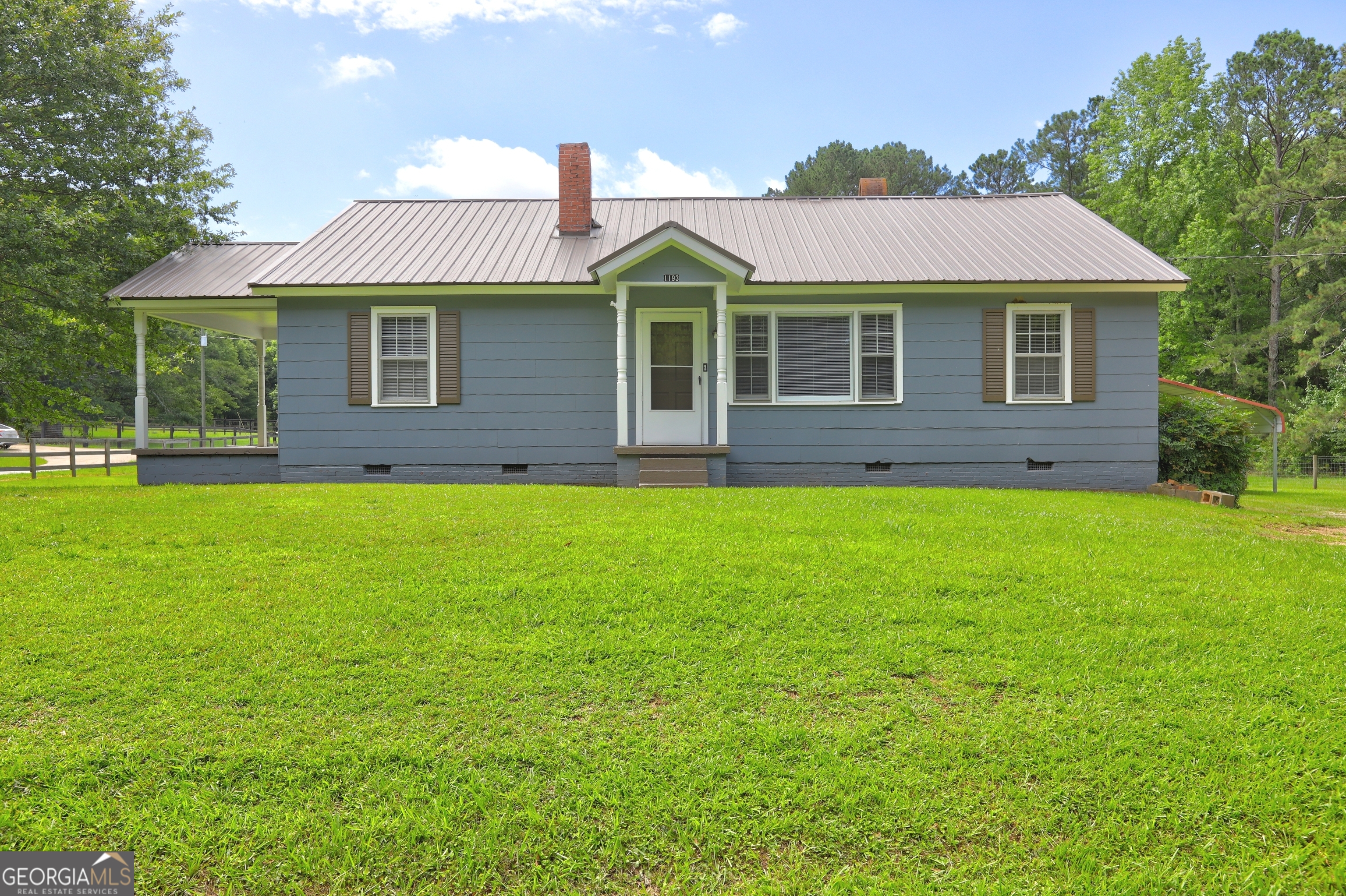 Welcome to your charming 1950s country cottage, nestled on over 2 acres of serene land along a quiet country road. This delightful 2-bedroom, 1-bath home offers a perfect blend of rustic charm and modern convenience, making it an ideal choice for first-time homebuyers or savvy investors. Enjoy the spacious outdoor area, perfect for gardening or outdoor activities, while being conveniently close to schools and local churches. With its inviting atmosphere and potential for growth, this property is a rare find in today's market. Don't miss the opportunity to embrace country living at its best! Survey in progress.