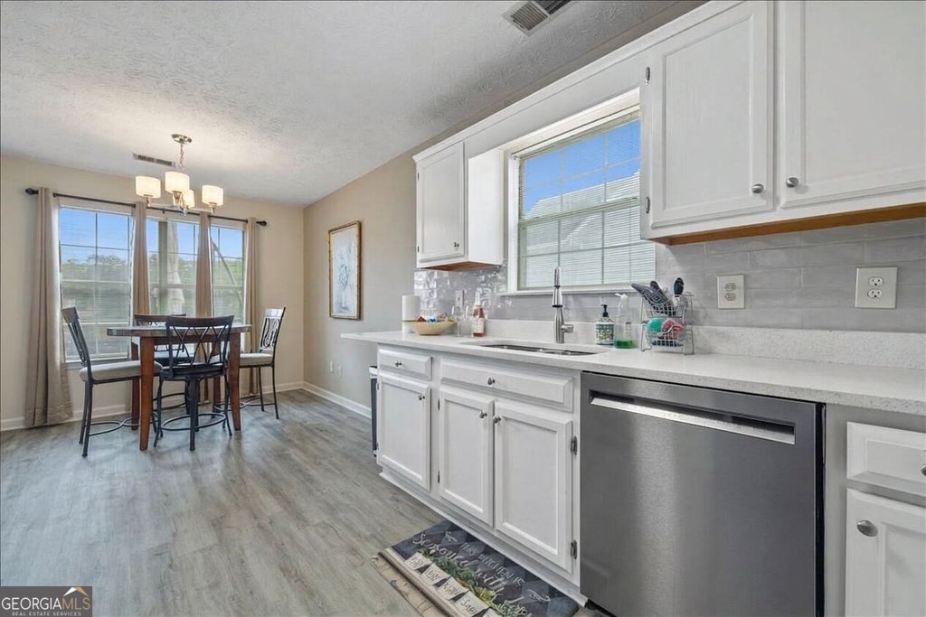 Photo of 6574 Oak Mill Ct, Morrow, GA 30260 (MLS # 10849364)