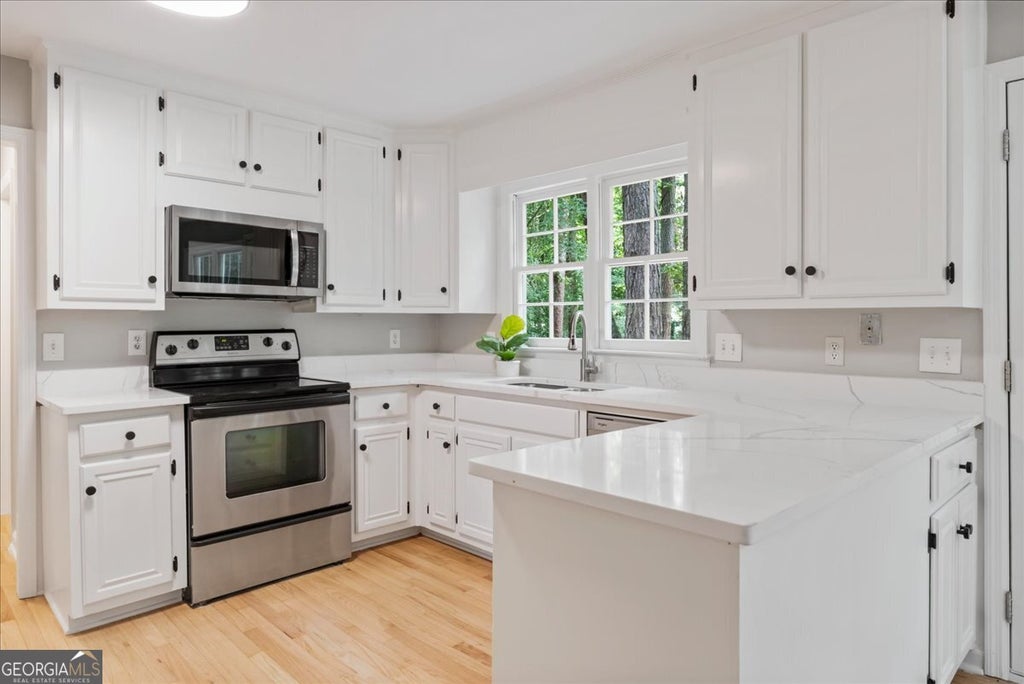 Photo of 153 Lakeside Drive NW, Kennesaw, GA 30144 (MLS # 10791557)