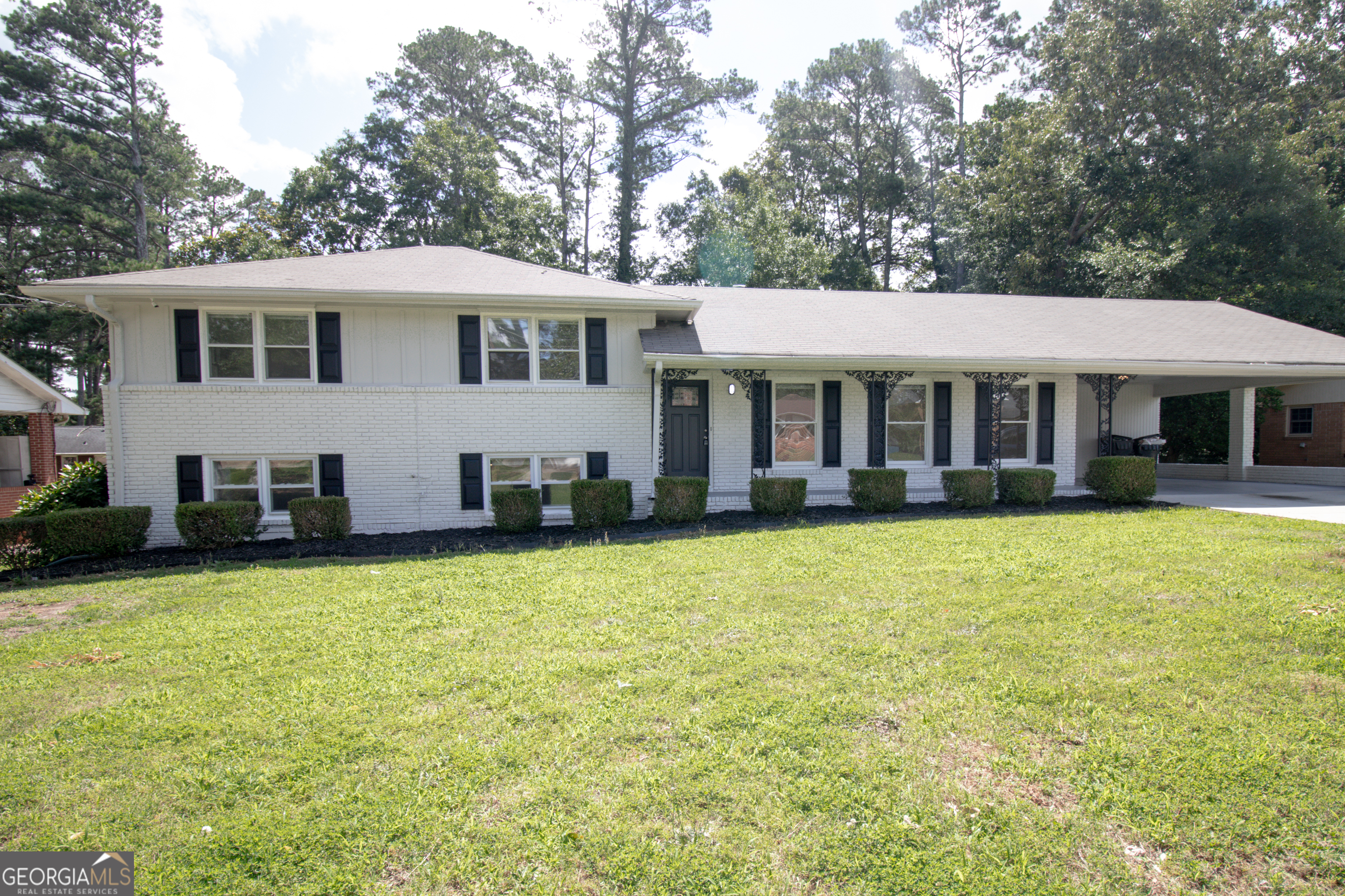 Bright and Spacious Split-Level Brick Ranch in East Point! Welcome to your next home sweet home! This charming split-level brick ranch offers a generous 2,587 square feet of living space with 5 bedrooms and 3 bathrooms-plenty of room for everyone to spread out and get comfortable. Need natural light? We've got you covered! With numerous windows, beautiful skylights, and a lovely bay window in the dining area, sunshine will greet you every morning. The home features modern luxury vinyl plank flooring throughout, giving it a fresh, contemporary feel while maintaining easy-to-clean practicality (because who has time for high-maintenance floors?). Step into the cozy sunroom where you can enjoy your morning coffee while watching the seasons change. The primary bedroom offers a peaceful retreat after long days, and the home comes with all appliances-including a brand new washer and dryer! Outside, a fully fenced backyard provides security and privacy for pets or just enjoying peaceful outdoor gatherings. The roof is only 6 years old, giving you peace of mind for years to come. Location-wise, you're in for a treat! Just minutes from Hartsfield-Jackson Atlanta International Airport (convenient for travelers!) and a short drive from College Park Golf Course where you can perfect that swing on weekends. This East Point gem combines comfort, space, and location in one attractive package. With its solid construction and thoughtful layout, this home isn't just a place to live-it's a place to thrive!
