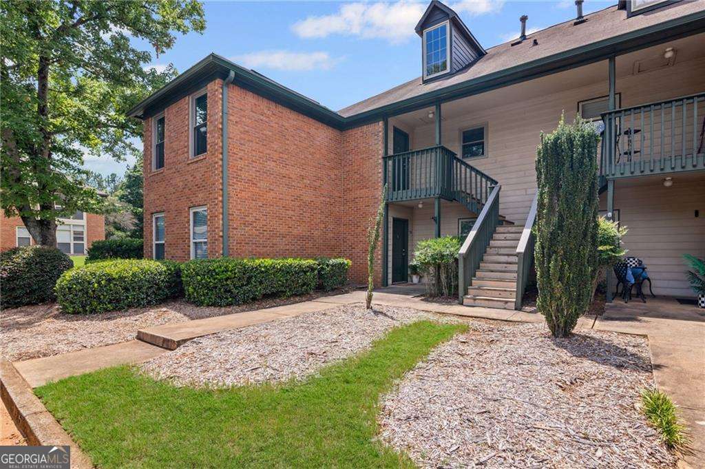 Priced to sell and ready for you! Welcome to Hampton Arbors, where this rare end-unit 2BR/2BA condo with a bonus room combines fresh renovations, unbeatable location, and a hard-to-find investment opportunity. One of the very few condos in the community eligible for immediate leasing, this home even comes with a guaranteed lease in place-making it a standout choice for both homeowners and savvy investors. Step inside and you'll love the over $35,000 in 2025 upgrades, including brand-new LVP flooring, freshly smoothed and painted ceilings with recessed lighting, granite countertops throughout, and a beautifully reimagined owner's suite featuring a custom walk-in shower. The smart split-bedroom layout gives everyone space, while the bonus room offers the perfect spot for a home office, dining nook, or flex space. Street-level entry makes coming and going a breeze-especially for families and guests. Location? It doesn't get much better. Stroll to nearby shopping, restaurants, and groceries, or hop in the car for a quick drive to downtown Duluth, Johns Creek, or Suwanee. Everyday conveniences like Kroger, Starbucks, Chick-fil-A, and Northside Duluth Hospital are just minutes away, with easy access to Peachtree Industrial Blvd and Chattahoochee River parks. All of this in a gated, amenity-rich community offering a pool, tennis courts, fitness center, and plenty of green space and walking trails. Whether you're ready to move in and enjoy or take advantage of its income-producing potential, this condo is an opportunity you don't want to miss. Schedule your tour today and see why this one won't last long!