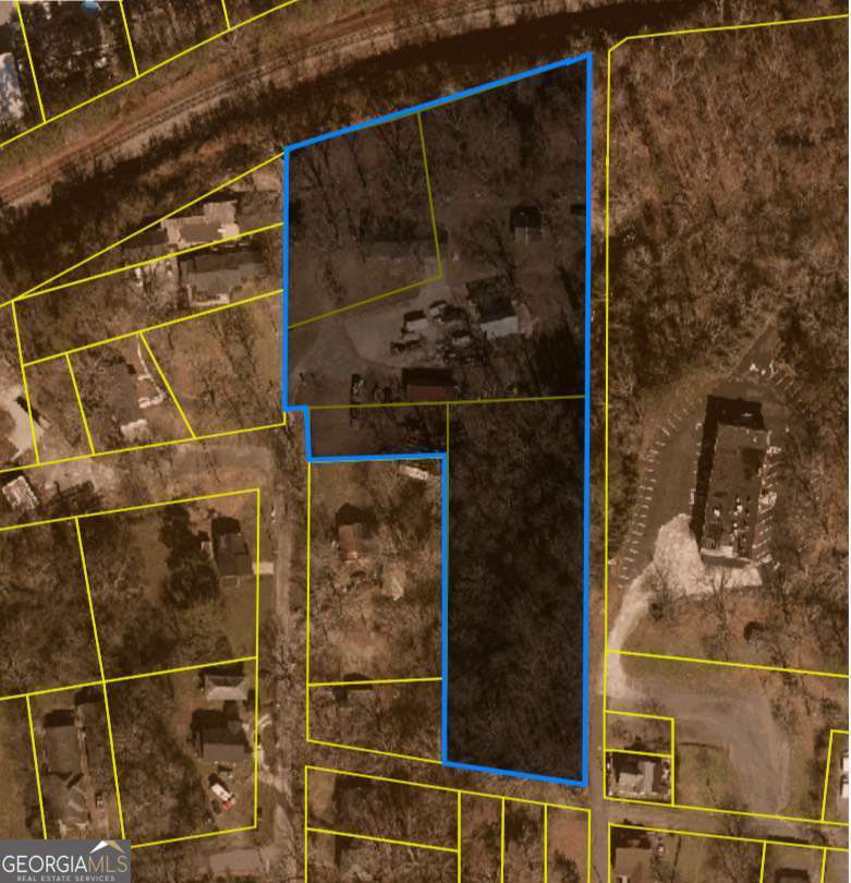 This expansive 4+/- acre property offers unmatched versatility in a coveted location. With its prime positioning at the end of a cul-de-sac, bordered by Desoto Ave, Avenue A, and Quarry St, it ensures easy access to all that Rome has to offer. The property is ideally suited for a variety of potential uses, whether as the site for a luxury residential development, a gated community, or even as a personal estate. The possibilities are endless with ample space for outdoor amenities or recreational areas, while still maintaining the exclusivity that such a unique location affords. For healthcare professionals, families, or those seeking quick access to top-tier medical care, the property is just minutes away from Atrium Health Floyd Medical Center and Advent Health Redmond Hospital, making it an ideal choice for those who prioritize health and wellness. Additionally, the proximity to major shopping hubs, dining venues, and entertainment options like Mid Town Crossing and Historic Downtown Rome means that everything you need is just a short distance away. Families will appreciate the convenience of nearby educational institutions, including Shorter College and Berry College, both within easy reach, as well as the ample recreational activities offered by Ridge Ferry Park, the Walking Trail along the Oostanaula River, Barron Stadium and the Rome Braves Advent Health Stadium. The propertyCOs location is also perfect for outdoor enthusiasts. With quick access to the Coosa River, Myrtle Hill, Sam King Ballfields & Boat Ramp, and other recreational spots, thereCOs never a shortage of activities to enjoy in your free time. Whether itCOs attending a local sports game at Berry's Football Stadium, The Rome Emperors baseball team or exploring nearby parks, residents will have endless options to stay active and engaged. With such an ideal location, this property truly stands out in a competitive market. Whether you are looking to build a luxurious, private residence, create a thriving community, or make an investment in one of Rome's most emerging side of town, this property represents a rare opportunity to own a piece of prime real estate in one of GeorgiaCOs most charming cities. DonCOt miss out, schedule or call today for a showing or more information and discover the full potential of this exceptional property in the heart of Rome. This property is in the Opportunity Zone and the T.A.D Zone