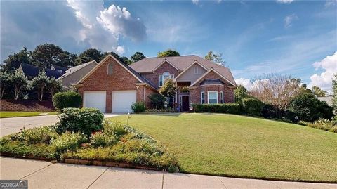 Photo of 7307 Carriage Creek Road, Woodstock, GA 30189 (MLS # 10616117)