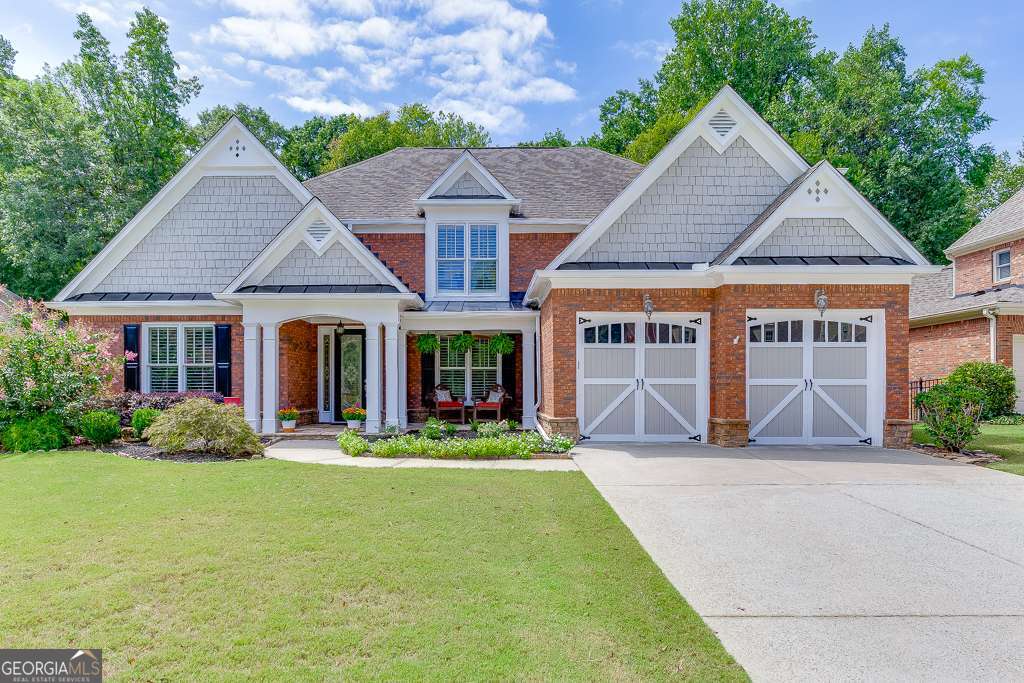 Welcome to this stunning brick residence in the coveted Mill Creek District, perfectly situated on a private cul-de-sac street creates a unique resort style luxury opportunity in the Mill Creek cluster. Since purchase, the owners have invested over a quarter of a million dollars in renovations and upgrades, creating a home that blends everyday comfort with resort-style living. From the moment you step inside, the upgrades are undeniable. The grand foyer with gleaming LVP floors leads to a formal office with cathedral ceiling and French doors, an elegant dining room with rich molding and butler's pantry, and a two-story great room flooded with natural light and anchored by a dramatic fireplace framed with floor-to-ceiling molding and windows. The outdoor living is a showstopper. A sparkling pool and spa finished in travertine "cool-temp" tile, surrounded by a new lower deck and lush professional landscaping with fresh sod in front, creates a private oasis for entertaining and relaxation. The chef's kitchen has been fully transformed with a new island, custom cabinetry, designer backsplash, painted finishes, sink/faucet upgrades, and premium appliances including double ovens, cooktop, dishwasher, and microwave. Additional improvements include new interior paint throughout (walls, trim, molding), new flooring and carpet, updated lighting in dining/bookcases/butler's pantry, and a beautifully remodeled master bath. With the Primary bedroom on the main level, this home offers so much upside for any Buyer. Upstairs, an oversized loft offers the perfect landing space, connecting to three large secondary bedrooms with walk-in closets and an upgraded full bath. Every bathroom in the home features new toilets and installations, while functionality is further enhanced with a new hot water tank, new water line, new water meter and gas regulator, two brand-new AC units, and a state-of-the-art critter control system. Complemented by new gutters, awnings, exterior paint, and custom doors, this home radiates curb appeal as well as peace of mind. This rare property combines elegance, function, and luxury at every turn. With over $250,000 in improvements, it delivers the ultimate resort-style lifestyle in one of the area's most desirable communities.