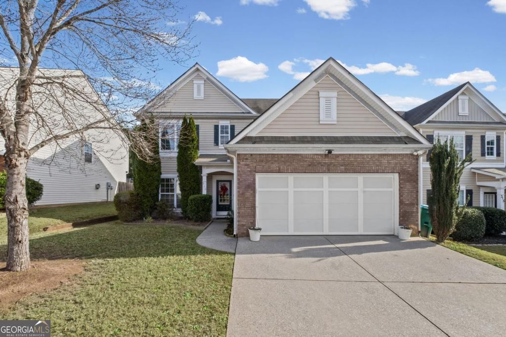 Photo of 313 Woodland Pass, Canton, GA 30114 (MLS # 10657326)