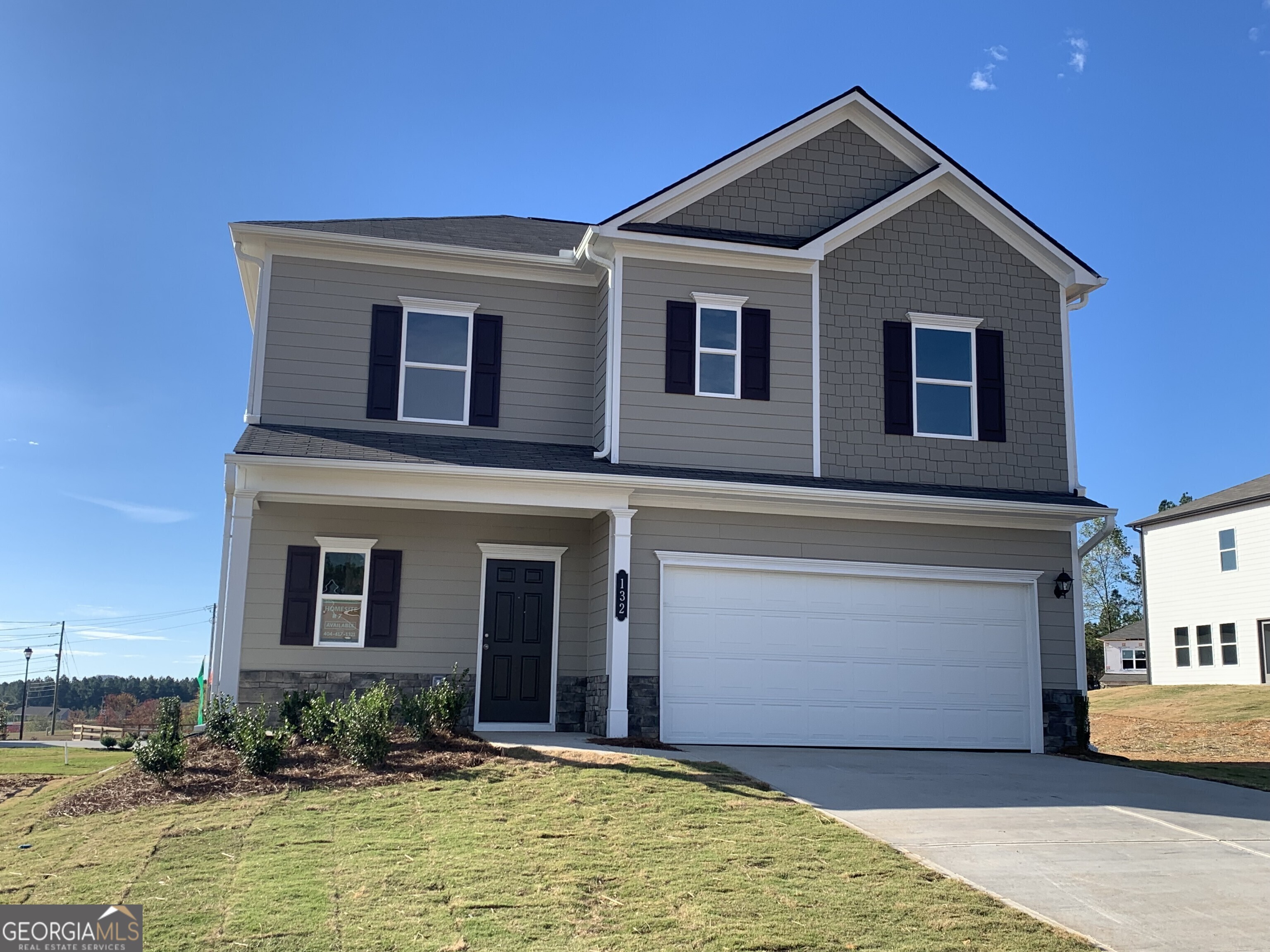 Move in Ready! The Benson II plan located in the Hopewell Manor community in Dalton and built by Smith Douglas Homes. Location, Location, Location! This community is located less than 30 miles from Chattanooga and only 20 minutes from the Chattanooga Airport! Be in your new home by the holidays!!! Seller is offering up to 12K incentive with contract that will close by Nov. 30th and with the use of preferred lender!!! The Benson welcomes with a covered front porch that opens to an inviting foyer. The foyer leads to the spacious and open family room and the adjacent kitchen. The kitchen has upgraded cabinets, granite counters, an island and a pantry. Access to the rear yard and patio is convenient. An additional window has been added in the family room allowing for more natural light. Upstairs on the second story, is the Owner's suite and bath with a separate shower and Garden tub with a picture window above. Three additional bedrooms, a shared bath and laundry complete this floor. Nine foot ceilings are on both levels. Photos representative of plan not of actual home being built. Smith Douglas Homes is the #1 private homebuilder in the Atlanta area. Ask about Seller incentives with the use of preferred lender.