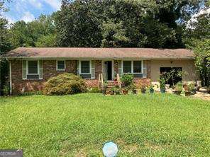 Public: LOCATION, LOCATION, LOCATION!!! Investor special or perfect starter home with fix and flip potential! Located in desirable Southwest Atlanta, just minutes away from downtown Atlanta, Hartsville-Jackson Airport, parks and walking trails, with restaurants and grocery stores nearby. This home sits on a large peaceful lot-ideal for those seeking rental income or an affordable primary residence. In this partially renovated home you will have GE Appliances, Delta touch faucet, workstation sink, new thermostat, new lighting, new patio door and Ring camera. The home is equipped with a new garage door that has a smart door opener with video. The basement is also semi-finished! Great layout with large kitchen! While it needs a little TLC, the strong bones and unbeatable location make this a prime opportunity for real estate investors, first-time buyers, or anyone looking for an affordable home in a high-demand area. Don't miss out on this value-packed property with endless potential! Property being sold AS-IS. All showings must be requested through showing time.