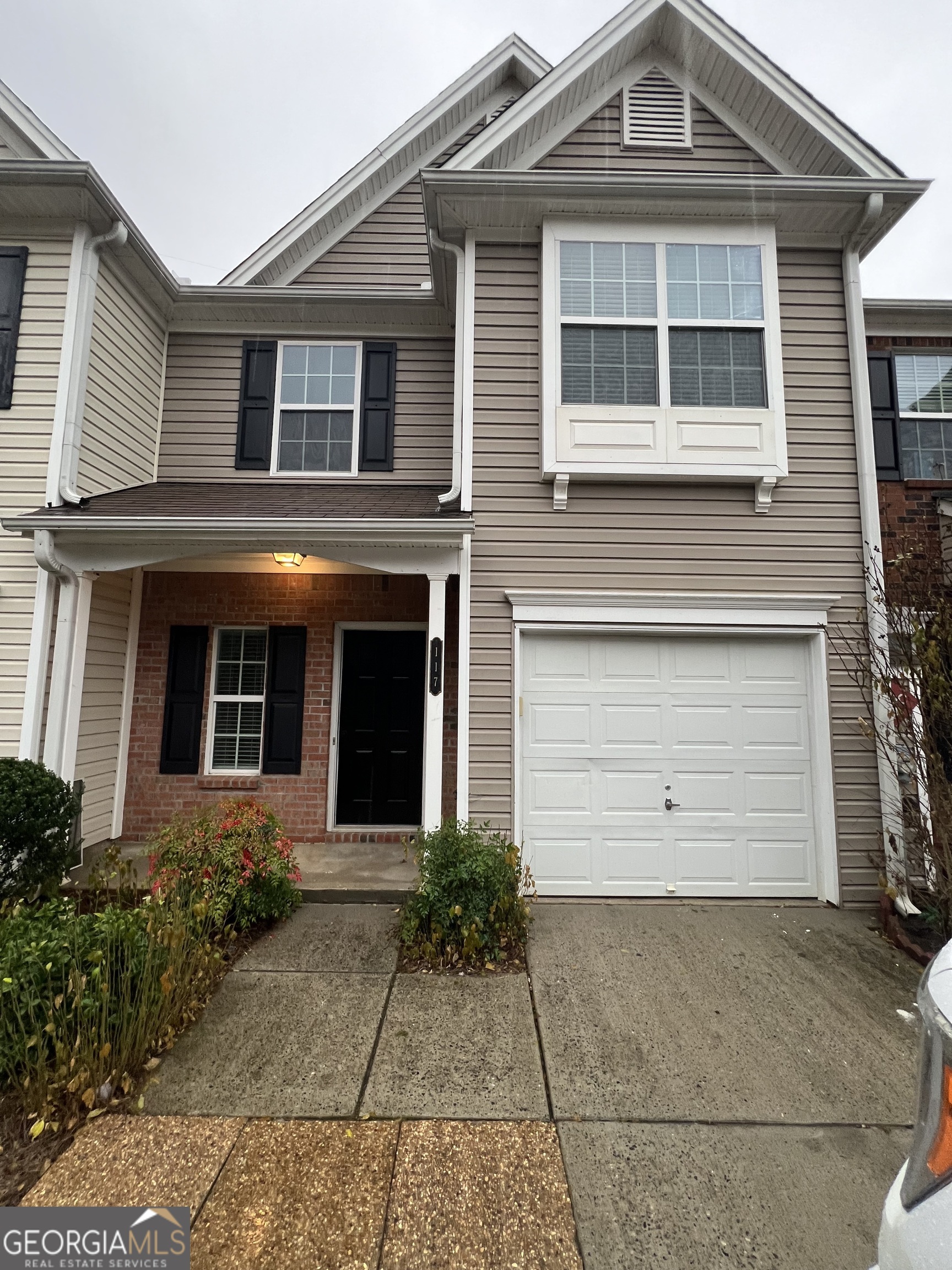 Beautifully Renovated Townhome in Gated Cumming Community! Welcome to your new home at 117 Primrose Drive in Cumming, GA! Nestled within a peaceful and secure gated community, this beautifully renovated townhouse offers the perfect blend of comfort, convenience, and style. Step inside and discover a bright and airy living space that flows seamlessly into a stylish dining area - ideal for both relaxing and entertaining. The modern kitchen boasts ample storage and counter space, making meal prep a breeze. A convenient half bath on the main level adds to the practicality of this lovely home. Upstairs, you'll find two spacious master bedrooms, each a true retreat with its own private master bathroom, ensuring ultimate privacy and comfort. For added convenience, a brand-new washer and dryer are also located on the upper level. Enjoy the ease of secure digital entry and the convenience of a one-car garage. Beyond your front door, the community offers fantastic amenities, including a sparkling swimming pool, tennis courts, and a basketball court - perfect for staying active and enjoying the outdoors! Location, Location, Location! This prime location offers easy access to GA 400, making your commute a breeze. You'll also find yourself just minutes away from a wide array of shopping, dining options, and the charming downtown Cumming area. Rental Details: Rent: $2,500/month Bedrooms: 2 (both upstairs with ensuite bathrooms) Bathrooms: 2.5 Garage: 1-car Amenities: Gated community, swimming pool, tennis courts, basketball court, secure digital entry, new washer/dryer upstairs. Optional: Furnishing and all utilities (wifi, water, sewer, gas, and electricity) can be included for an additional monthly cost. Don't miss this incredible opportunity to live in a beautifully renovated townhouse in a sought-after Cumming location. Contact us today to schedule a viewing!