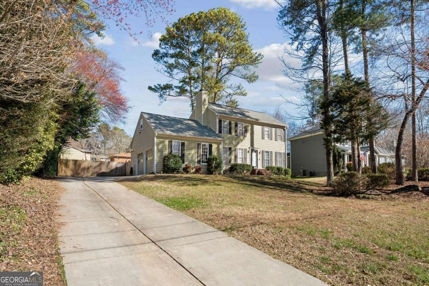 Welcome to 557 Spring Creek Way in the heart of Marietta! This charming three bedroom, two and half bathroom home is an incredible opportunity to make it your own. Nestled on a spacious lot with a fenced in backyard and a large deck perfect for entertaining, this home offers both cozy living and room for customization. The kitchen has been thoughtfully and meticulously renovated, featuring premium countertops, custom white cabinetry and finishes that elevate the heart of the home. This property offers an ideal canvas for the discerning buyer to add their personal touch and create a one of a kind living space. The neighborhood has recent sales reaching up to $850,000, ensuring a promising investment for years to come. With the added benefit of no HOA, you can enjoy both luxury and freedom in this exceptional community. This is an opportunity to own a property that is primed for both immediate comfort and long-term value!