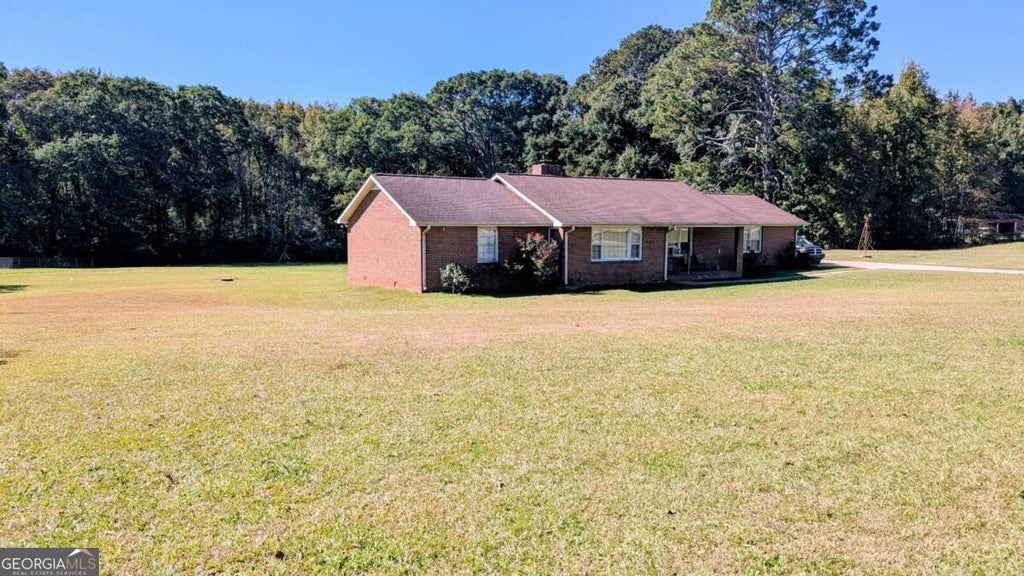Photo of 3341 Old Covington Highway, Covington, GA 30014 (MLS # 10881175)