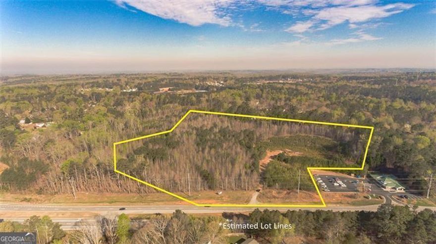 14.67 acres of commercial land on Highway 120 (Charles Hardy Parkway/Dallas Highway) in East Paulding County. Sewer connection available. Great location for restaurant, retail, office, or distribution. Zoned Commercial (B-1) and near the major intersection of Hwy 120 and Hwy 92. Location is between the recently developed Costco and Super Walmart on the highway connecting Dallas and Marietta. One mile from the Cobb County line.