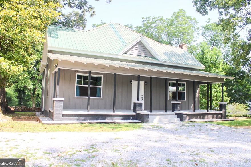 Completely Renovated 5-Bedroom 2.5 bath Home in Valley, AL - Modern Comfort Meets Classic Charm   Welcome to your dream home in Valley, Alabama! This beautifully renovated home offers 2,528 square feet of thoughtfully updated living space, blending timeless character with modern upgrades. From the moment you arrive, you'll notice the eye-catching LP Smart Siding, new windows, and meticulous craftsmanship throughout. Inside, refinished original tongue-and-groove walls and ceilings bring warmth and personality, the updates ensure long-term peace of mind-including tiled showers, a new water heater, new insulation, and updated plumbing and electrical systems. Step outside to enjoy a spacious yard, perfect for gatherings, gardening, or simply relaxing in your own private oasis. A detached carport provides convenient covered parking, and an outbuilding offers extra storage or workshop potential. This move-in-ready property combines the charm of a classic home with all the benefits of a modern renovation. Don't miss this rare opportunity-schedule your showing today!