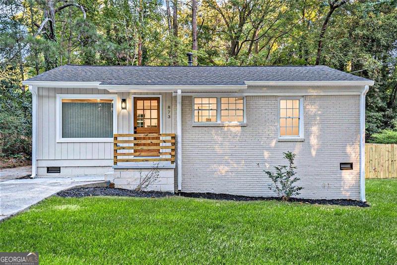 Welcome to 873 Mercury Dr in the heart of Atlanta, GA-a beautifully updated gem that perfectly blends modern convenience with timeless charm. Step inside to be greeted by stunning vaulted ceilings that create an open and airy feel, making the home feel even more spacious. This house is equipped with brand-new essentials: a high-efficiency HVAC system, water heater, furnace, and roof, ensuring comfort and peace of mind for years to come. The recent addition at the back of the house adds extra living space, perfect for a growing family or entertaining guests. Step outside to your private oasis, complete with a brand-new back deck, freshly installed fence, and upgraded gutters. The outdoor space is ideal for relaxing, grilling, or simply enjoying the Atlanta weather. Inside, you'll find impeccable cosmetic updates throughout, with modern finishes that complement the home's original charm. This move-in ready property is perfect for anyone looking for a stylish, worry-free home in a prime location. Don't miss your chance to own this beautifully renovated retreat!