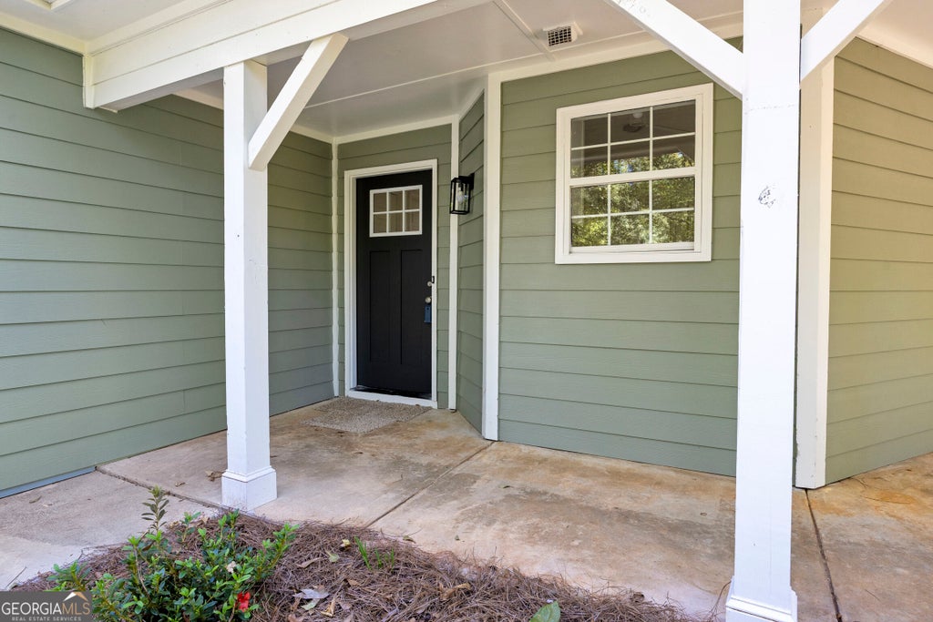 Photo of 25 Christian Woods Lane, Conyers, GA 30013 (MLS # 10876745)