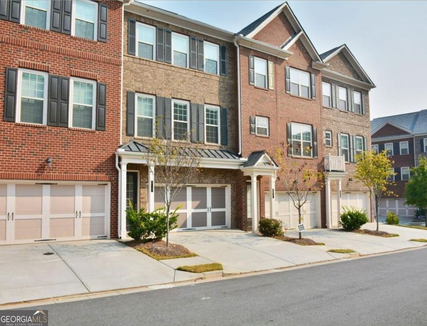 This spectacular 4 bedroom 2 full bathrooms and 2 1/2 baths...tri-level Townhome has an open, spacious feel yet will give you all the privacy you need. Home includes a gourmet kitchen with granite counters, stainless appliances, upgraded cabinetry, island and breakfast bar that opens to the great room. There also is a balcony. Finished lower level with 4th bedroom and private 1/2 bath. You couldn't ask for a better location! Avalon, Verizon Amphitheater, and GA 400 are all near by! Tenant Qualification: Rent: $3,100/mo, Security Deposit:$4,650, Pet Deposit $1,250. ($1,000 refundable and $250 non refundable). Clean Screening report and Annual Income(3.5 X the rent or More) ***Pictures are from when the unit was vacant***