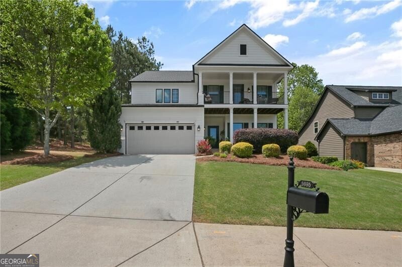 Welcome to this stunning Southern charmer, nestled in a highly sought-after school district! Massive Price Refresh! This beautifully maintained single-family home exudes classic Southern architecture with a double front porch that invites you to relax and unwind. Boasting exceptional curb appeal, this home features a bright and open floor plan with timeless interiors, perfect for any decor style. Step inside to discover gleaming hardwood floors throughout the main level, complemented by freshly painted walls and new carpet upstairs. The gourmet kitchen is a chef's dream, professionally painted cabinetry, granite countertops, and a separate dining room with elegant trim and a tray ceiling. A versatile sitting room, ideal as a home office, adds to the home's functionality. Cozy up by the fireplace in the inviting living room or retreat to the serene, Eden-like backyard for ultimate relaxation. Upstairs, the oversized primary bedroom offers a generous walk-in closet and a luxurious ensuite. The secondary bathroom features a double vanity, and one of the secondary bedrooms opens to a charming covered porch, perfect for morning coffee or evening stargazing. This vibrant community offers incredible amenities, including a private entrance to the Big Creek Greenway, ideal for outdoor enthusiasts, pool, Pavilion, Walking Trails, and Park. Extremely convenient location close 400, The Halcyon and Fowler Park. With a newer roof and neutral interiors, this move-in-ready home is a rare find. Don't miss the opportunity to own this Southern gem in a premier location!