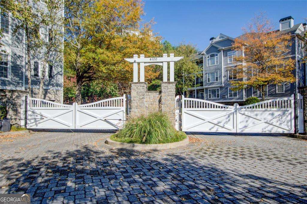 Upscale gated community in elite Vining's neighborhood. This condo is on the top floor, as you open the front door you look at brand new 3 inch dark wood floors, freshly painted walls and open concept. This unit has high 10 foot ceilings, 2 bedrooms with gorgeous bathrooms. Primary bedroom has a large bathroom with double sinks, shower and bathtub. This condo is close to downtown Smyrna, all interstates are 2 minutes away. Close to the Truist Park and shopping. Dog Friendly. A must see and will not last long! Seller will contribute $3500 towards closing cost. Enjoy Atlanta living but COBB county TAXES! Seller is to pay 6 months of HOA DUES at closing