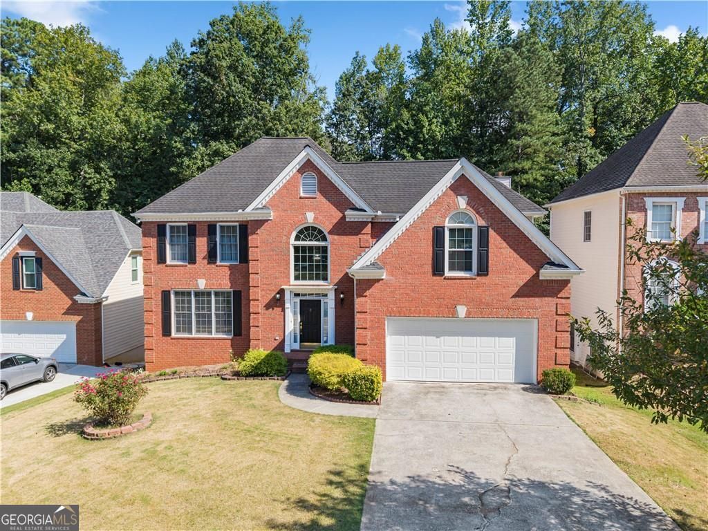 Photo of 3884 Meandering Way SW, Lilburn, GA 30047 (MLS # 10806593)
