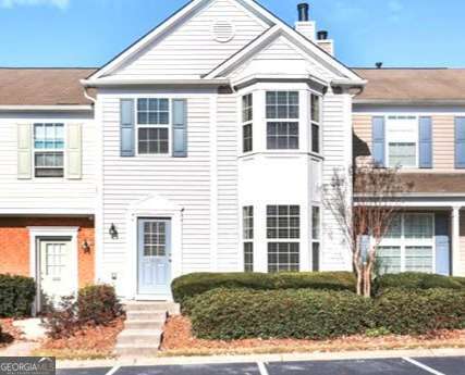 Beautifully maintained 3BR/2.5BA townhome in highly sought-after Whittington community, available September 1, 2025 (possible early occupancy if needed). Featuring brand-new flooring and an open-concept layout, this home offers a spacious great room with corner fireplace and a large, flat backyard-perfect for relaxing or entertaining. The primary suite overlooks green space and provides a peaceful retreat. Prime location off Windward Pkwy (Exit 11), just minutes from GA-400, Avalon, shopping (Target, Costco, Kroger, Walmart), dining, and major employers. Top-rated Forsyth County schools. Community amenities include two swimming pools and walkable green spaces. Public transportation nearby with a bus stop at the community entrance and direct MARTA access via Windward Park & Ride. Owner covers HOA, which includes trash, pest control, and exterior maintenance. Two assigned parking spaces. Don't miss this opportunity for convenience, comfort, and location all in one!
