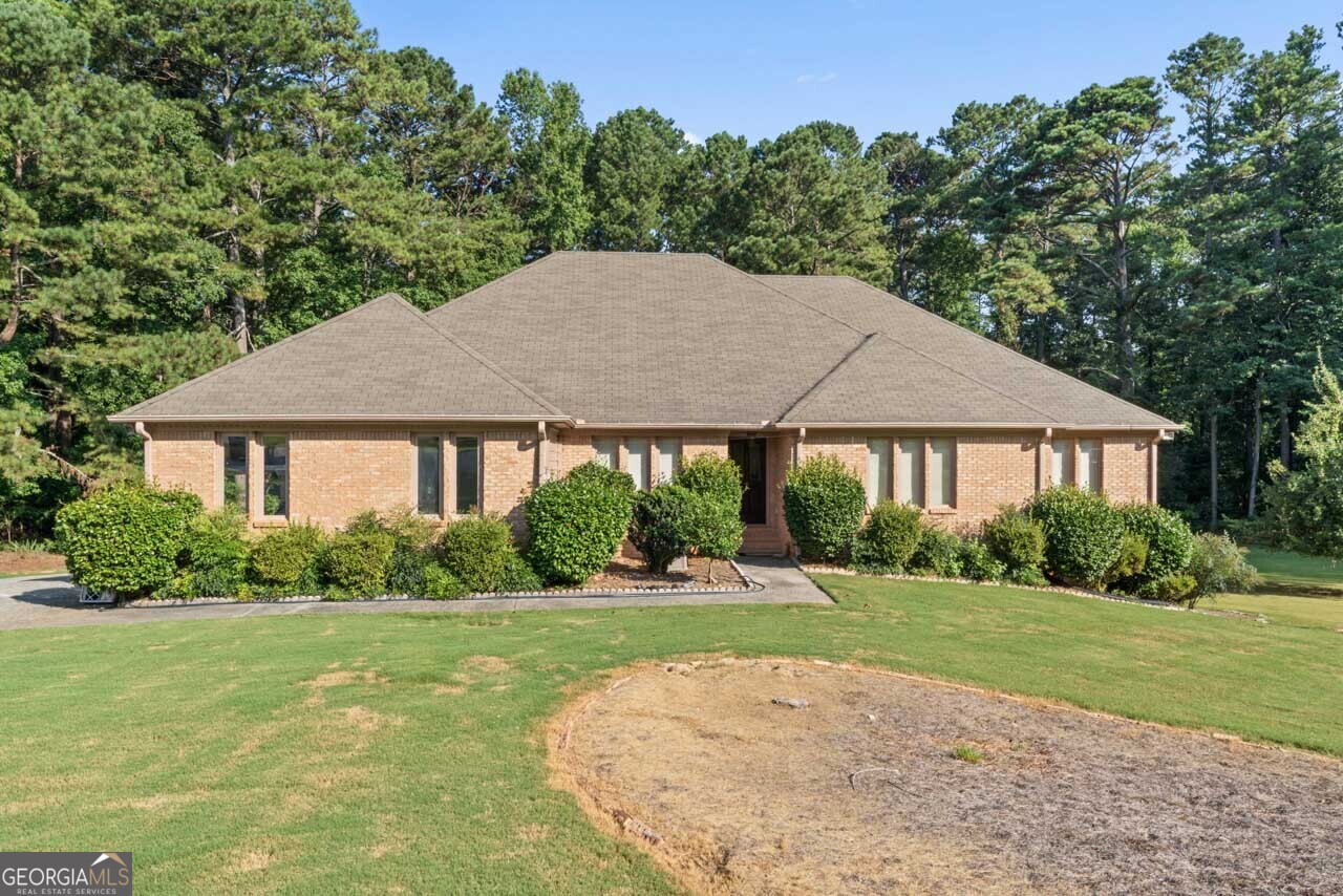 Welcome Home to this 2,831 sqft brick ranch on a full basement. The home consists of 4 bedrooms and 3 full bathrooms on the main with 2 bedrooms and 1 full bathroom in the basement. The kitchen features a fridge, microwave, dishwasher, wall oven, cooktop and a breakfast area. It is sitting on 1.48 acres of land with plenty of room for the outdoors. On the main floor you have a 2-car garage, large kitchen, office, great room, laundry room, dining room, sitting room and a sunroom. The basement has a large great room, kitchen, tons of storage space, its own 1 car garage and storage outside under the sunroom. Outside you have a large front yard and tons of backyard to enjoy with family and friends.