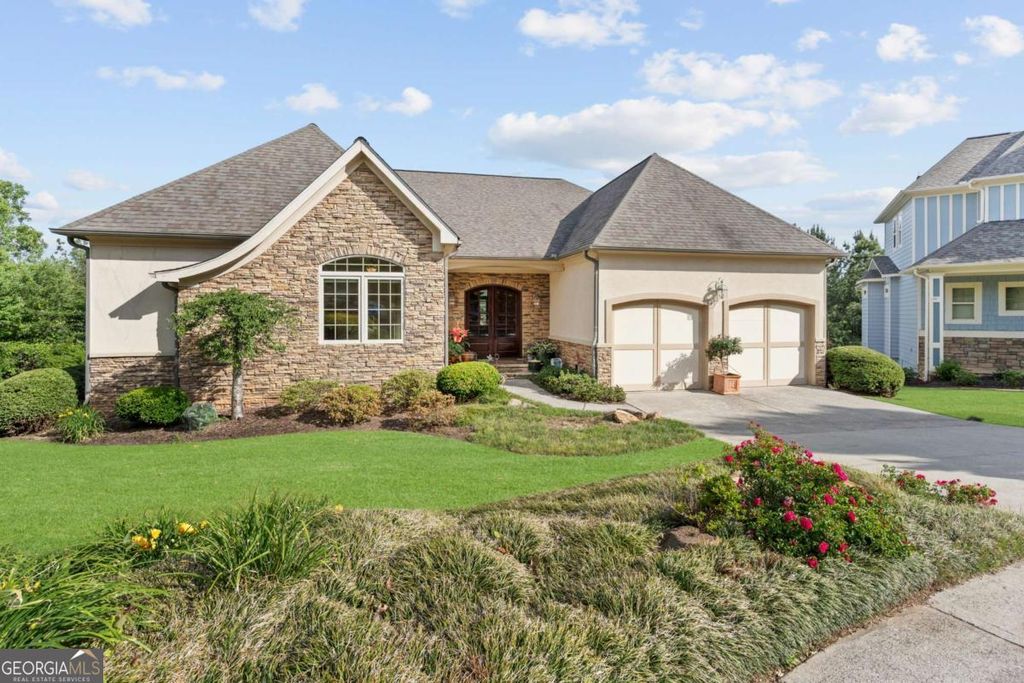 Photo of 233 Towering Peaks, Canton, GA 30114 (MLS # 10761117)