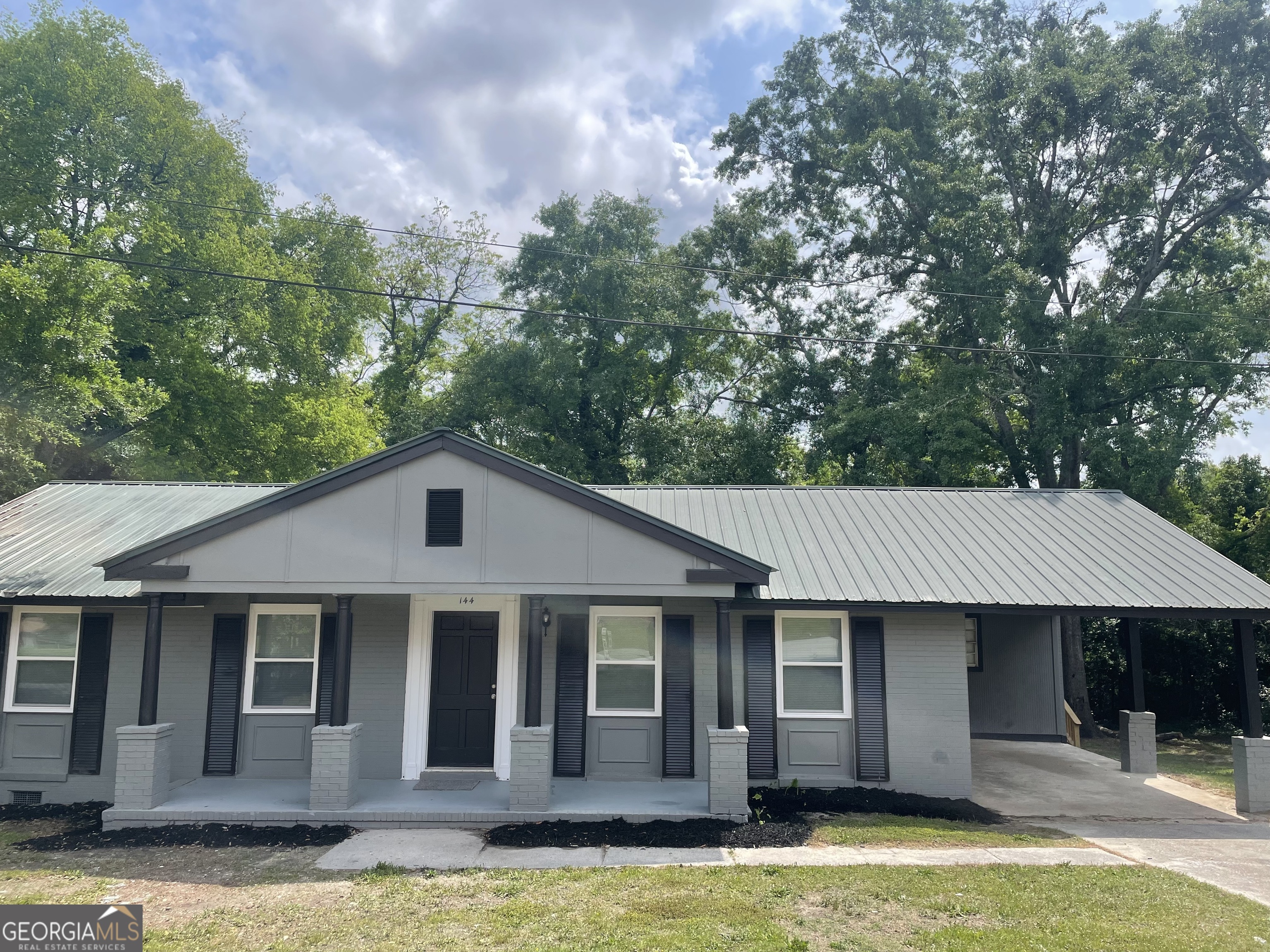 Beautiful 4 bedroom 2 bathroom fully remodeled brick home with a metal roof. This house has a large rear back porch that will be great for entertaining. You can have this house at an amazing price of 169,000. Call Brian Dudley today at 478-357-6337 for a showing.