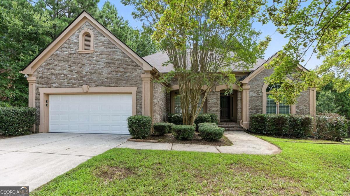 Freshly painted interior adds a welcoming touch to this charming 3-bedroom, 2-bathroom ranch-style home nestled in a quiet Holly Hill neighborhood with no HOA. This well-maintained residence offers a functional layout featuring a spacious living room with a cozy fireplace, a separate dining area, and an inviting kitchen with plenty of natural light. The primary suite includes a private bathroom and ample closet space. Enjoy outdoor living on the patio overlooking a generous backyard-perfect for relaxing or entertaining. Schedule a showing today! One or more photos have been virtually staged.