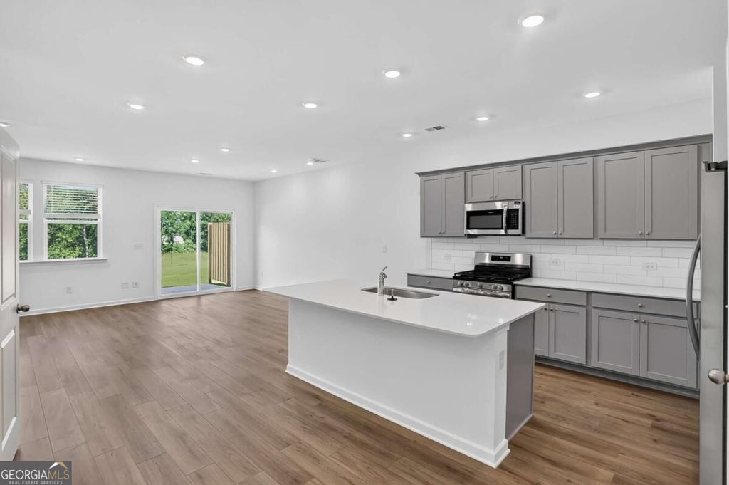 Photo of 3046 Humdala Place #227, Buford, GA 30519 (MLS # 10855147)