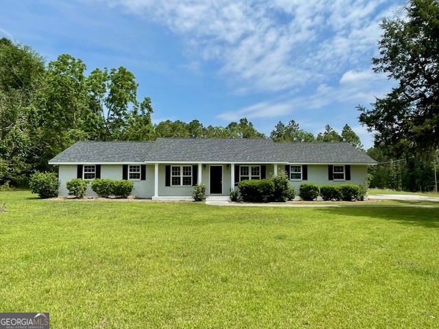 This stunning, brick home is nestled in a serene country setting, perfect for those seeking tranquility and space! With 1,697 square feet H/C, this beautifully remodeled residence features three bedrooms, two bathrooms, and an office/bonus room that can be customized to your needs. The large backyard offers plenty of room for outdoor activities or gardening, set on over an acre of land. Inside, enjoy the comfort of a new HVAC system, modern stainless steel appliances, and luxurious granite countertops. The home has been updated with new flooring and fresh paint, ensuring a move-in ready experience. The large laundry room and attached garage add to the convenience of this exceptional property. For more details or to schedule a viewing, please contact Victoria Leigh Smith Realtor -Weichert, Realtors Webb & Assocaites. Virtual Tour available!