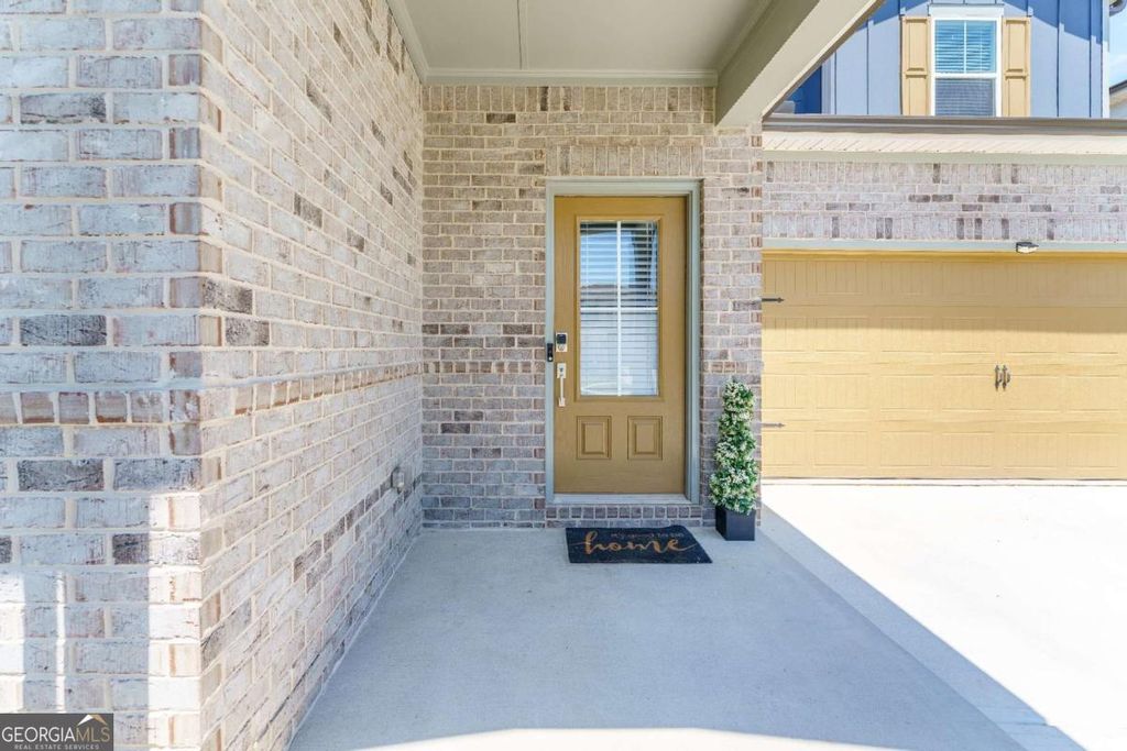 Photo of 7164 Brushwood Bend, Lithonia, GA 30058 (MLS # 10754290)