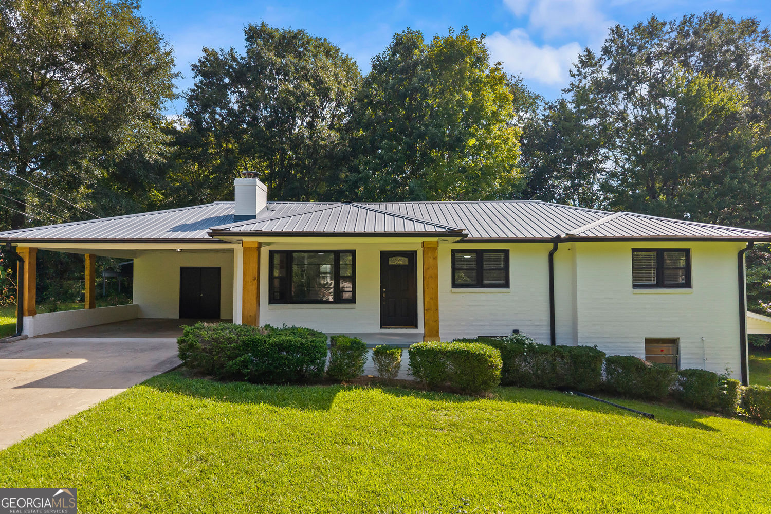 Located just minutes from shopping, dining and many other features Toccoa has to offer, this beautifully maintained home features an inviting open concept floor plan perfect for modern living. The updated kitchen showcases quartz countertops and stainless steel appliances. The main level offers three bedrooms, all with hardwood floors, providing comfort and style. The lower level can be accessed from both the interior and exterior, making it an ideal setup for multi-generational living, guest accommodations, or rental potential. It includes a second kitchen, bathroom, living area, and additional flex rooms for endless possibilities. This versatile home combines location, updates, and functionality - ready for its next owner to make it their own!