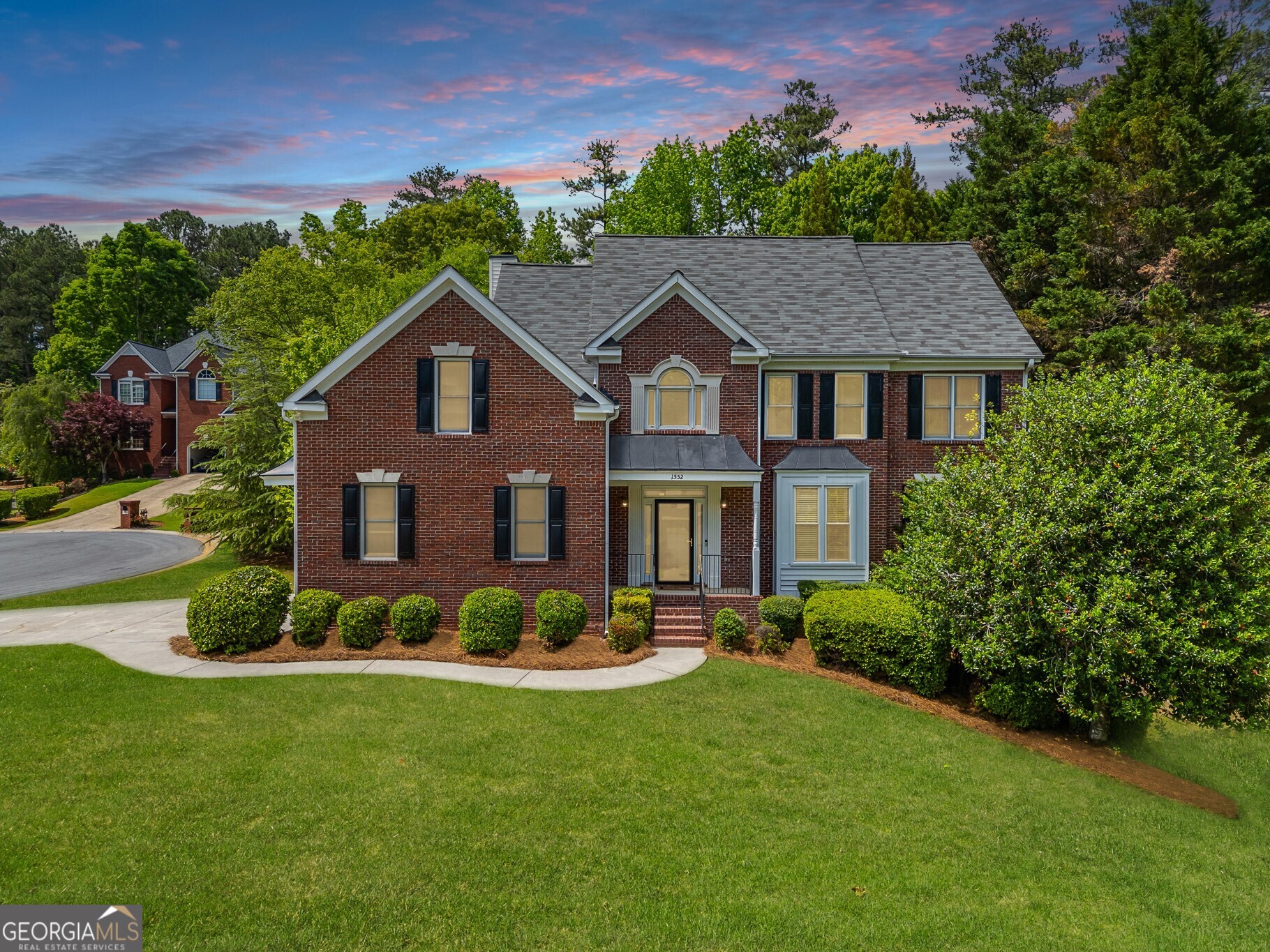 Located on a quiet cul-de-sac in Brentwood Park-a sought-after swim and tennis community in East Cobb-this 5-bedroom, 3.5-bathroom home offers comfort, space, and timeless style. The two-story foyer leads to a welcoming sitting room and an elegant formal dining room, perfect for entertaining. The fireside living room flows seamlessly into a bright kitchen, complete with newly installed matte granite countertops, abundant cabinet storage for any kitchen appliance imaginable, a walk-in pantry, and a breakfast nook with views of the back yard. Just off the kitchen is a well-appointed laundry room with additional storage. Throughout the home, you'll find beautiful hardwood floors, updated light fixtures, and a 1 year old water heater. Head out onto the private screened-in porch to enjoy your morning coffee or unwind in the evening. The adjacent back deck overlooking the level backyard offers the ideal spot for outdoor summer grilling. Plus there's a newly renovated powder room, conveniently located away from the main living space. Upstairs, the oversized owner's suite features a tray ceiling and a spacious ensuite bathroom with dual vanities, new quartz countertops, a whirlpool garden tub, a separate shower, and generous double walk-in closets. Three additional bedrooms and a dual-entry bathroom with separate new quartz vanities complete the upper level. If that wasn't enough square footage, the finished basement provides flexible living space ideal for an in-law suite, featuring a den, a rustic bedroom and bath adorned with beautifully stained shiplap walls and ceilings. There's also ample unfinished space for storage, hobbies, or a workshop. Neighborhood amenities include a clubhouse, pool, tennis and pickleball courts, a playground and multi-sport court. Easy access to I-75, GA-120, Marietta Square, shopping, restaurants and cafes!