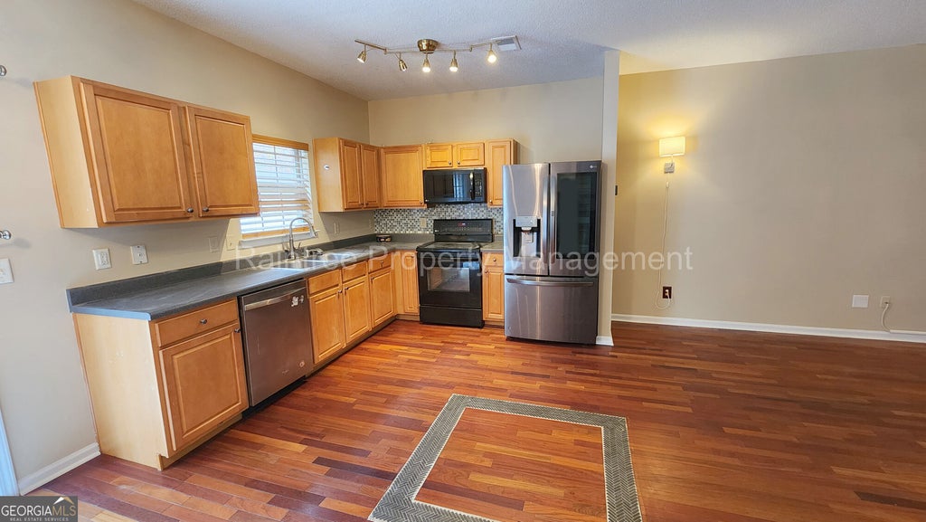 Photo of 3854 Pleasant Oaks Drive, Lawrenceville, GA 30044 (MLS # 10878821)