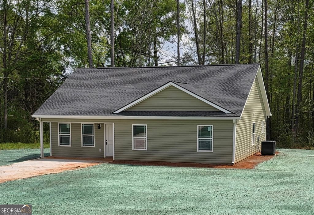 Photo of 91 Holly Grove Road, Griffin, GA 30224 (MLS # 10730452)