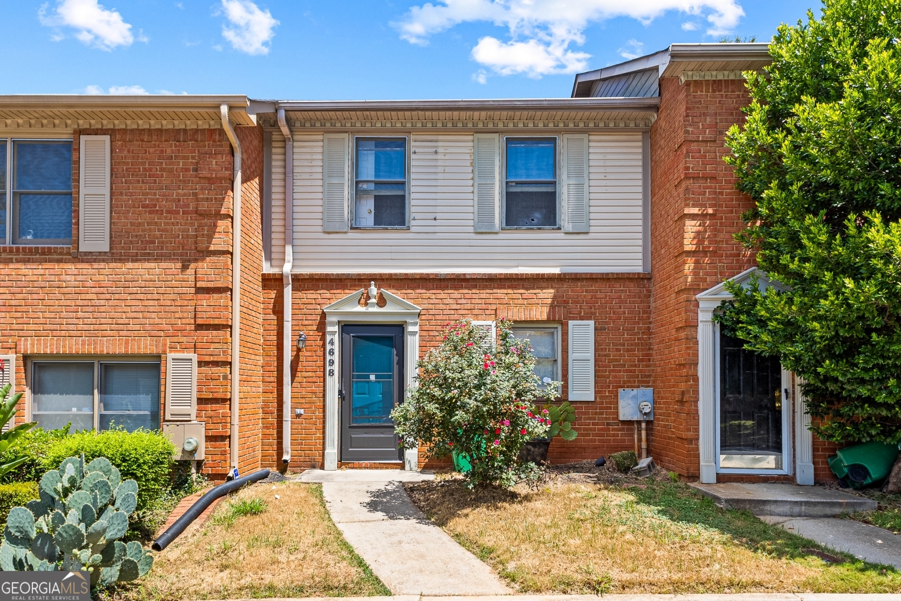 Nice move in ready Townhome. This home features an updated kitchen with stainless steel appliances. Nice dining and living room area. 2 bedrooms upstairs with private bathrooms and a half bathroom downstairs. Low HOA fees. Less than 30 mins from the airport. Less than 10 minutes from Stone Mountain Park.