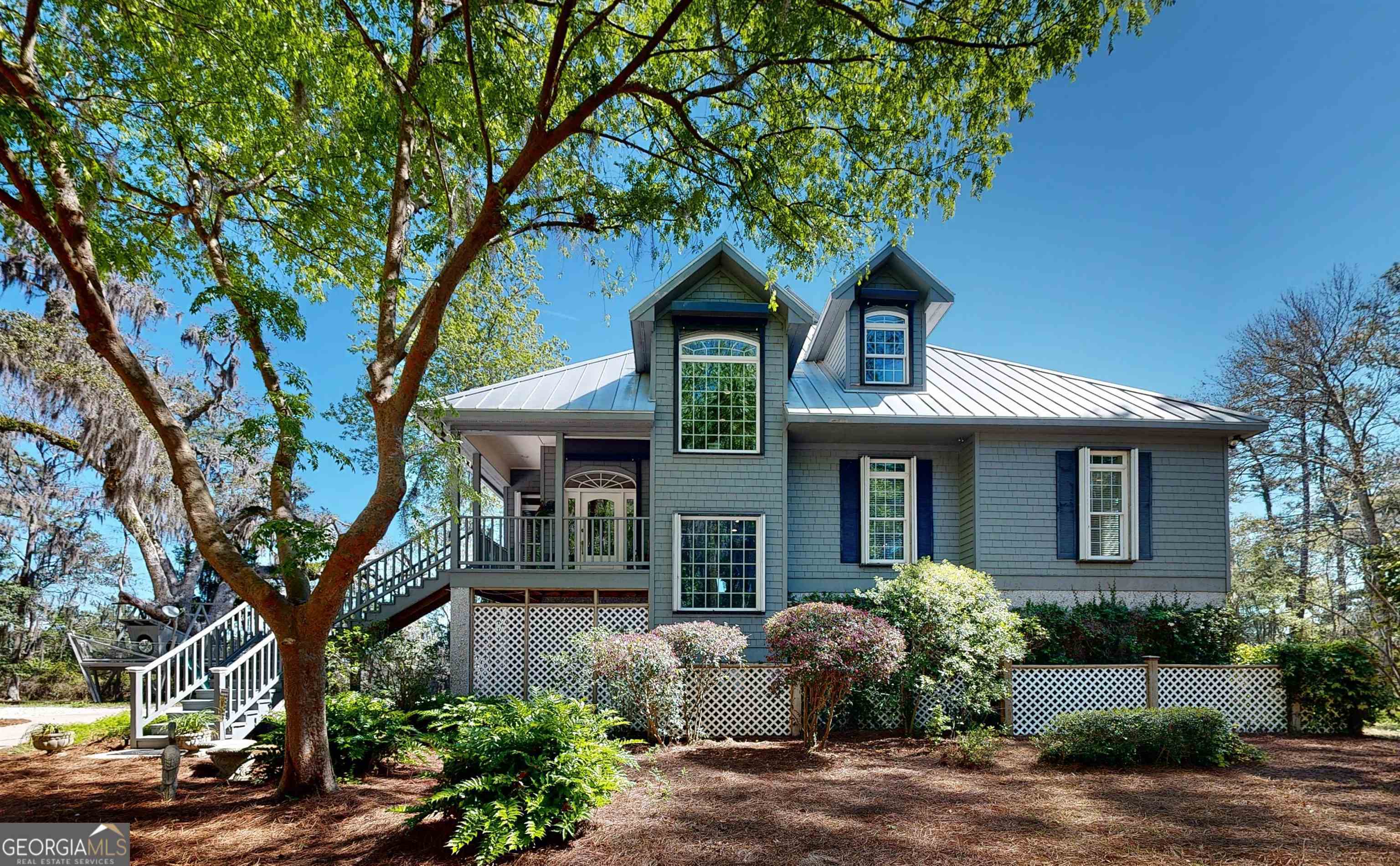 $10,000 Price Improvement! Gorgeous sunrise vistas from this Private Coastal Compound with gorgeous Marsh front home with Guest Cottage situated upon 4+ acres. Vaulted ceilings, spectacular views of marsh, Sapelo and St Simons. Elevator from garage to main. 2BR Guest  cottage, Impeccably decorated and completely furnished. Private chipping tees and putting green. Black Island is a gated private eco-community on a tidal island, hidden away between Savannah & St Simons. Unspoiled and untamed, once a lookout post for Ft. King George and hunting grounds for R.J. Reynolds, There is very little development and no public access. Beautiful native woodlands have been preserved. Amenities include community deepwater dock with lift, clubhouse with area for oyster roasts & low country boil. 30 Acres of Unspoiled Greenspace. Private and Secluded. 5 minutes to historic fishing village of Darien for shopping, dining, churches, schools. 15 minutes to Sam's Club, Brunswick Airport and Brunswick Country Club. 25 minutes to the beach. 90 minutes to Savannah and Jacksonville. Check out the Teaser https://www.youtube.com/watch?v=rhR0OCSFaJQ