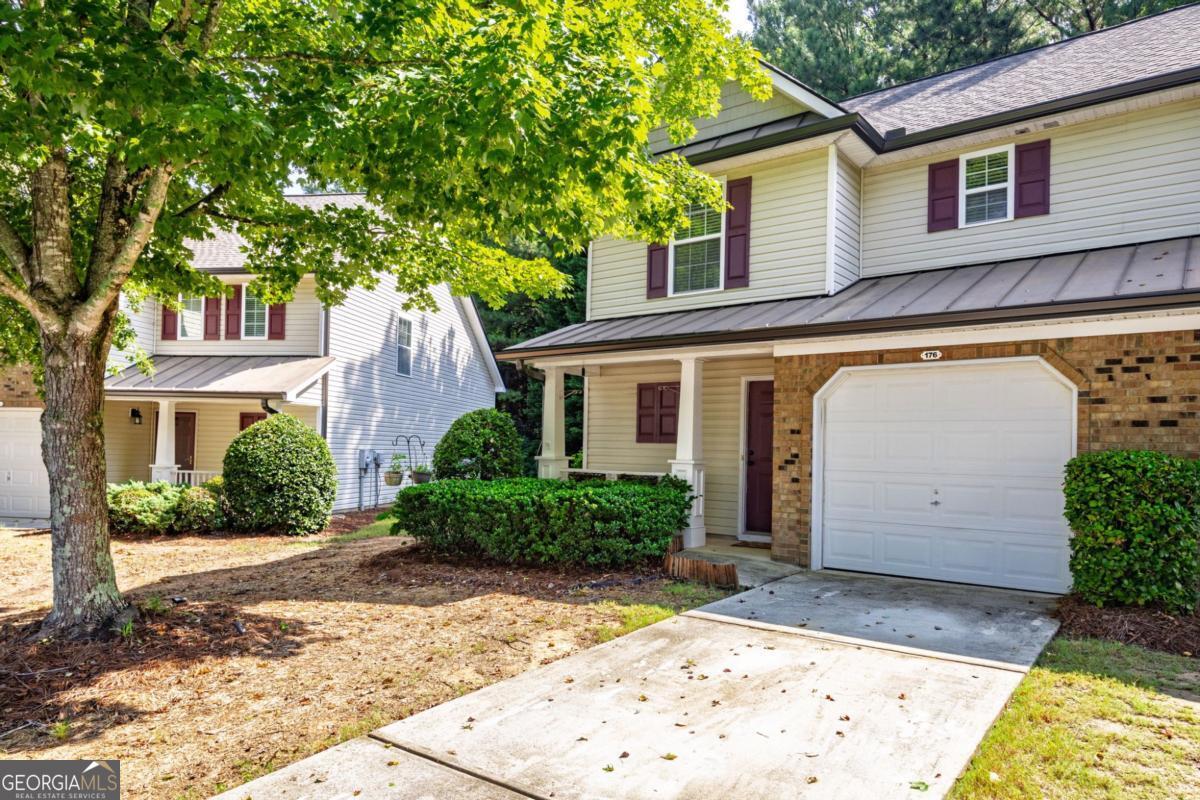 Para espanol, por favor llamar al cuatro cero cuatro 9445840. Welcome to 176 Darbys Crossing Ct. This lovely townhome is perfectly nestled less than 2 minutes from Charles Hardy Pkwy/Ga-120, Ga-92, and Hwy 278, all while being only 5 minutes from shopping and dining. This 2 bedroom, 2 bath townhome has been recently updated with all new interior paint, laminate floors throughout, and updated lighting and hardware. The living room is ample sized and is open into the dining area. On the upper level you will find a master bedroom suite, as well as a secondary bedroom with full guest bath. There is even a loft area big enough for an office, or a lounging area. There is even a garage to keep your sporting equipment or park the car. Located at the back of the neighborhood, this end unit features the privacy of trees in the back, as well as lots of windows to allow for natural light to fill the home. Lawncare is included! Privately owned and managed, you wont have to deal with corporate lease companies. Available for immediate move-in, this one is perfect for you! Apply here - https://apply.link/HR2g_-k