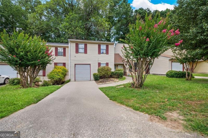 Welcome to 1006 Pine Tree Trail! This 4 bedroom, 2 bathroom condo is perfect for owner-occupants and investors alike. There are no rental restrictions in this community. This home features an open floorplan, spacious bedrooms, a garage, and plenty of storage space. It is very close to Atlanta Hartsfield-Jackson airport, shopping, parks, and public transportation.