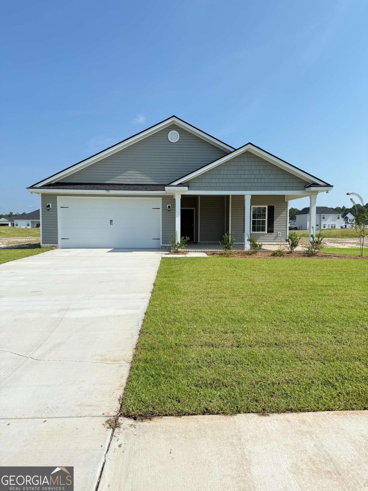 Brand new construction in newly developed Lanier Ridge subdivision. This beautiful one story home features an open living room and dining area that leads to the back patio offering an ideal space for entertaining. The plan contains 9 ft. ceilings throughout with 3 bedrooms and 2 full baths. The master suite is spacious with a bath featuring dual vanity sinks, garden tub, and separate shower. Kitchen has stainless steel appliances with granite countertops. Living areas are floored with luxury vinyl plank; carpet in bedrooms. Yard is landscaped and includes front irrigation. Community amenities include common area maintenance, street lighting, and mailbox kiosks. The home is located in Ludowici within a mile of Long County schools and only a short drive to Hinesville.