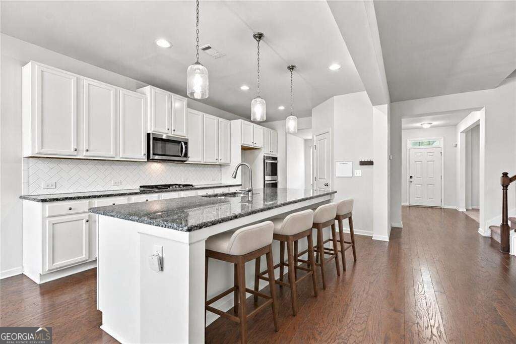 Photo of 5470 Mirror Lake Drive, Cumming, GA 30028 (MLS # 10873403)