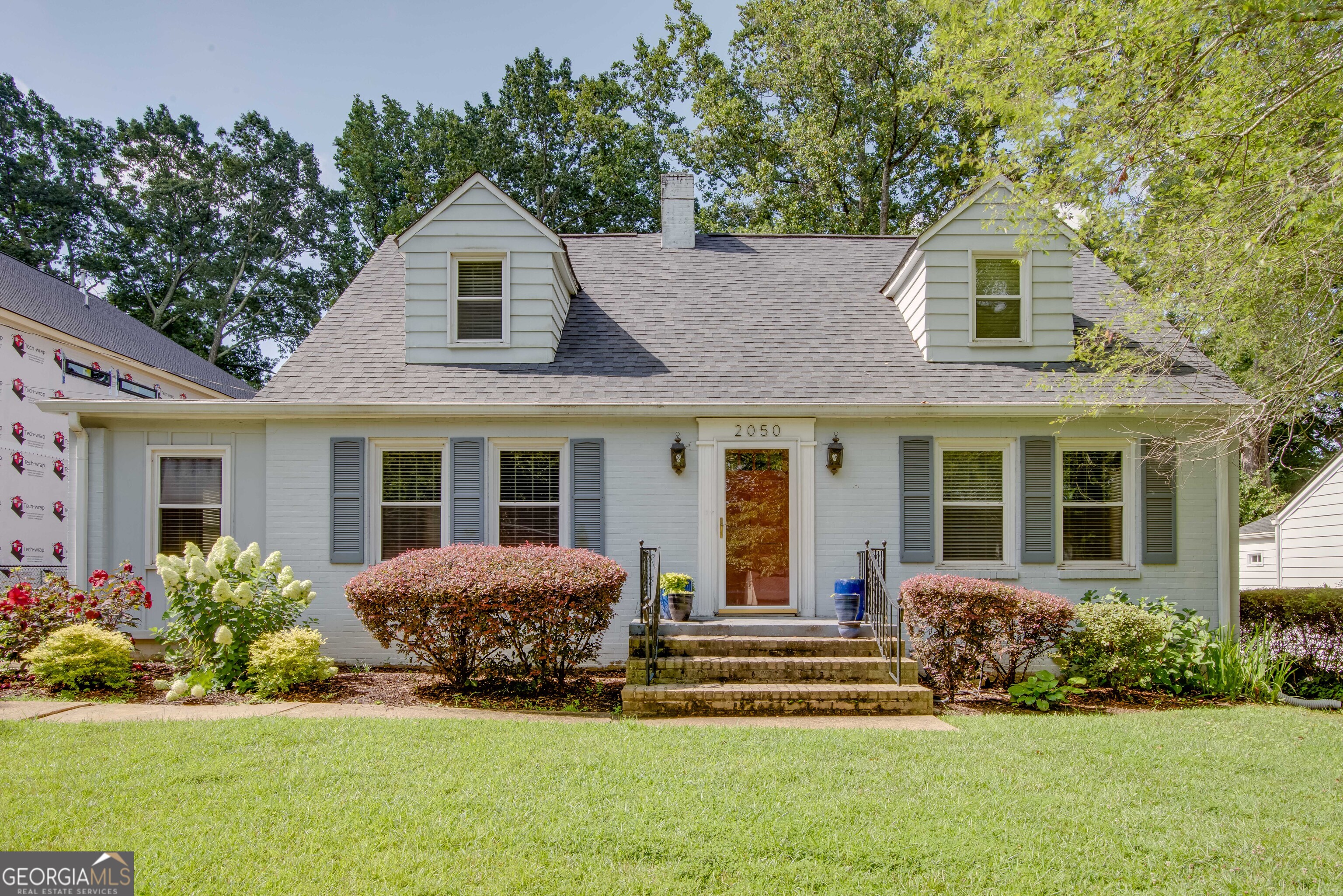 Charming All-Brick Home Near Barrett Park and Woodward Academy. Welcome to this beautiful all-brick home, ideally located just steps from Barrett Park and Woodward Academy's Primary Campus. Inside, you'll find a spacious living room, separate dining room, and an updated kitchen that opens to a large family room with a cozy fireplace which is perfect for relaxing or entertaining. The main level offers two well-sized bedrooms and a recently renovated full bathroom, along with a dedicated office space. Upstairs, you'll find two oversized bedrooms and a stylishly updated bathroom with ample space for family or guests. Step outside to a huge back deck that overlooks a large, private backyard which is ideal for gatherings or quiet evenings. Conveniently located near the Atlanta Airport, Delta headquarters, Porsche Experience Center, Tyler Perry Studios, and major highways. Don't miss this incredible opportunity in a prime location!