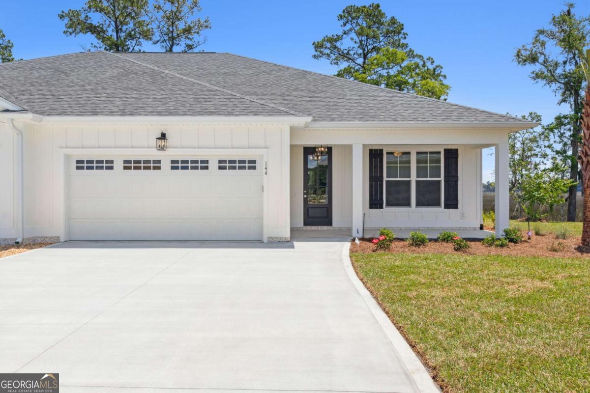 Enjoy amazing marsh views from the back porch, perfect for morning coffee or evening relaxation. Situated at the end of a cul-de-sac, this new construction home, by Josselyn Homes, provides both comfort and style. Located in the Marsh Harbour community at Laurel Island Plantation - a sought-after golf course community. You will want to bring your golf cart, because this home is located within 1.5 miles from, Laurel Island Links golf course, Bogeys Bar & Grill, & and the popular Karv Bistro. Perfectly positioned near I-95, enjoy an easy commute to both Brunswick and Kings Bay. This 2 bedroom 2 bath home features energy efficient radiant barrier plywood roof sheathing, board & batten siding, a split floor plan with open concept living space, custom cabinetry & stainless/slate appliances. The primary suites boast an elegant master bath with double vanity, soaker tub & tile walk-in shower. HOA fee covers well water for built-in irrigation and common area maintenance. **Seller holds a Real Estate license in the state of GA & related to listing Broker.