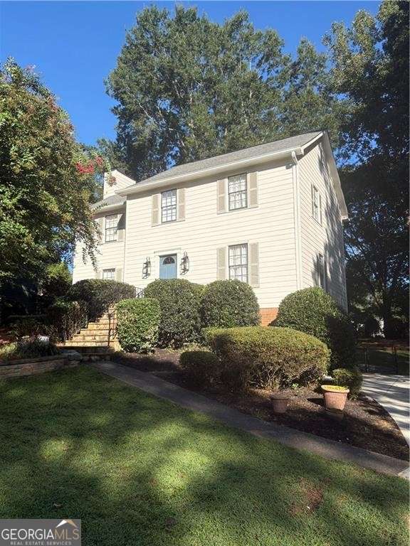 Welcome to the wonderful neighborhood in East Cobb. This beautiful updated 4 bedroom, 3 full bath/one half bath has a beautiful private fenced backyard with a screened porch, deck and slate filled fire pit. The main floor consists of a family room, kitchen, kitchen sitting area, foyer, dining room and a half bath. Upstairs you will find 3 bedrooms with a spacious primary suite with bath and walk in closet. Two other bedrooms share a full bath. In the partially finished basement, you will find another bedroom with a full bath. This vibrant community has a swim team, tennis, pickleball, playground, park, walking trail around the fishing pond with a full social calendar. Professional pictures coming next week.