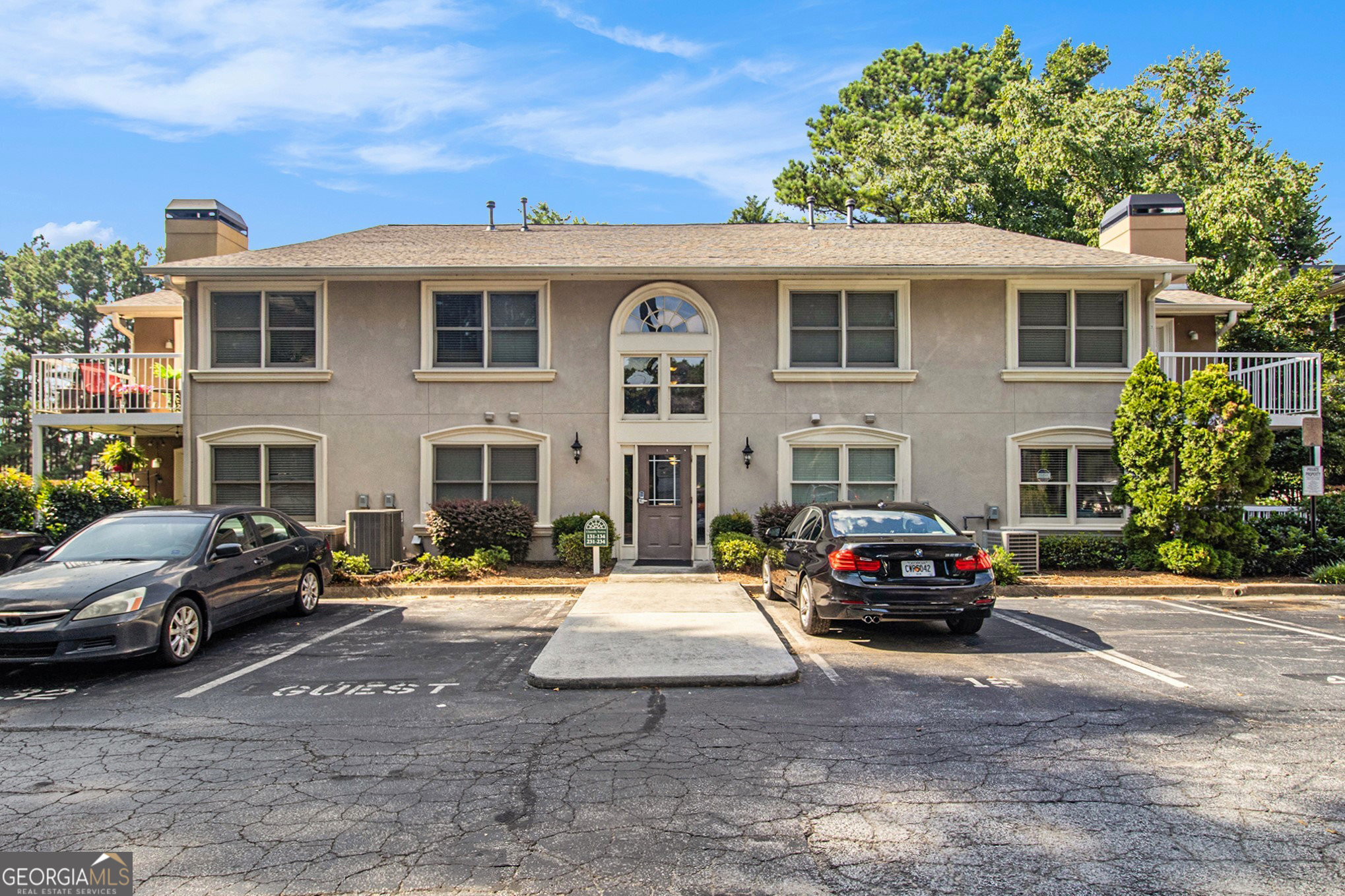 This beautiful Brookhaven condo is the most spacious one-bedroom you can find! Fantastic open floorplan includes the kitchen with breakfast bar; dining, living and sunny den areas, large bedroom and bath, utility room and foyer. You will love the stylish upgrades: stunning wood acoustic panels on walls, bright new lighting, built-in cabinets and shelving, luxury flooring; fresh paint, and a beautifully-renovated bathroom and tiled shower. With the best location in the community, your sunroom and porch have the best natural views, and the concrete porch is large enough for entertaining and a patio garden. This great home also has its own parking space and a storage room right next to the condo. Great community amenities, too: pool, grilling area, pet park, and ample guest parking. You can walk or roll to restaurants and retail and Executive Park. LaVista Park is one of the best locations in metro Atlanta; Chantilly Station is just minutes from CHOA, I-85, Emory, Lenox, and everywhere you want to be. You WILL love it here!